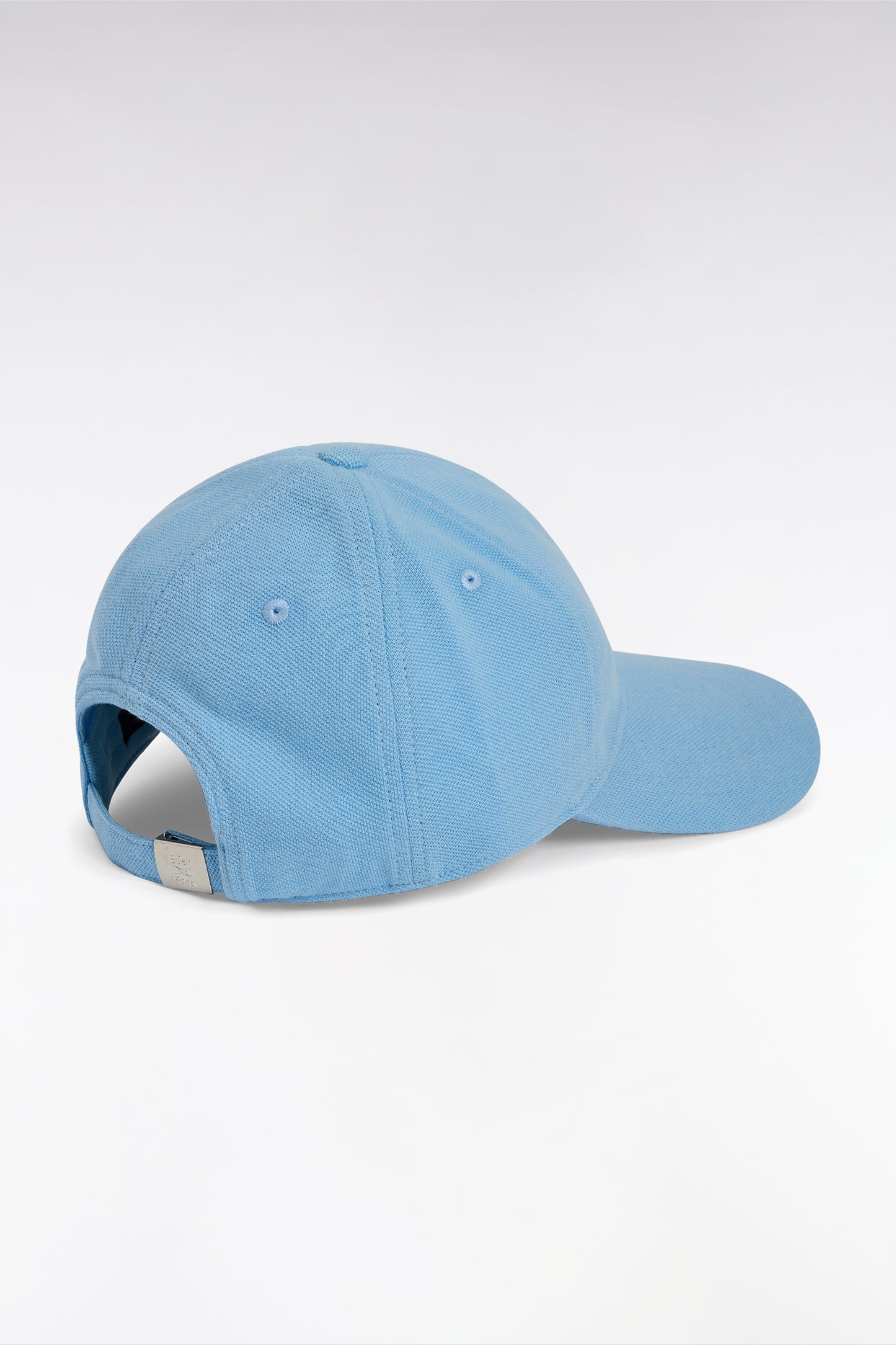 Sky blue cotton piqué cap with bow tie embroidery