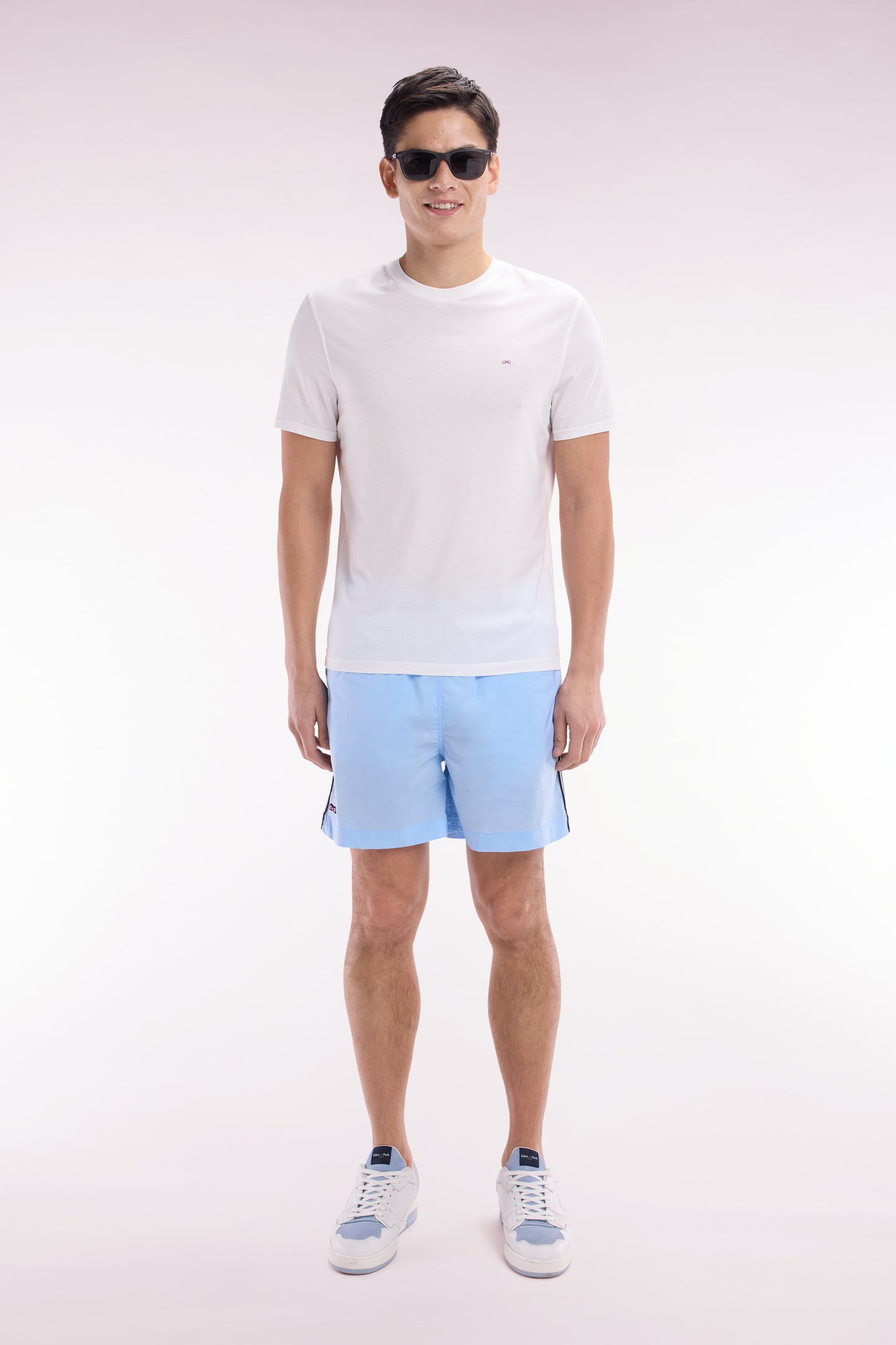 Sky blue swimsuit with tricolor details