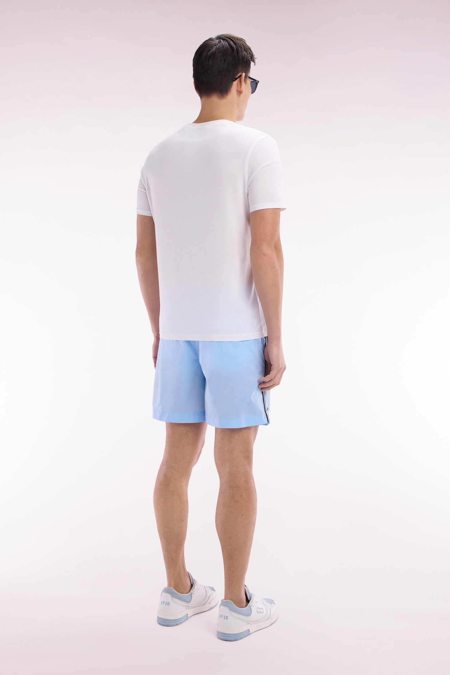 Sky blue swimsuit with tricolor details