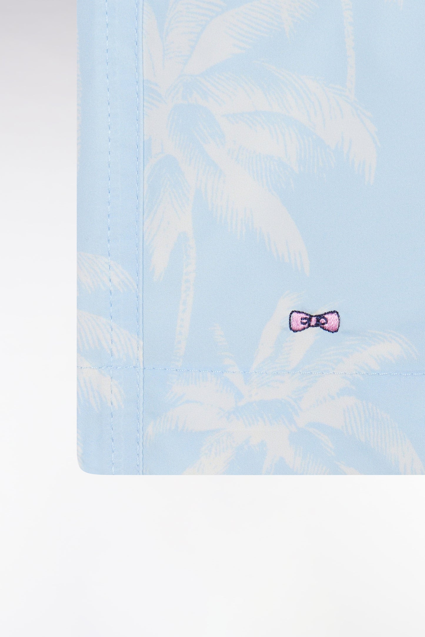 Sky blue swimsuit with palm tree print
