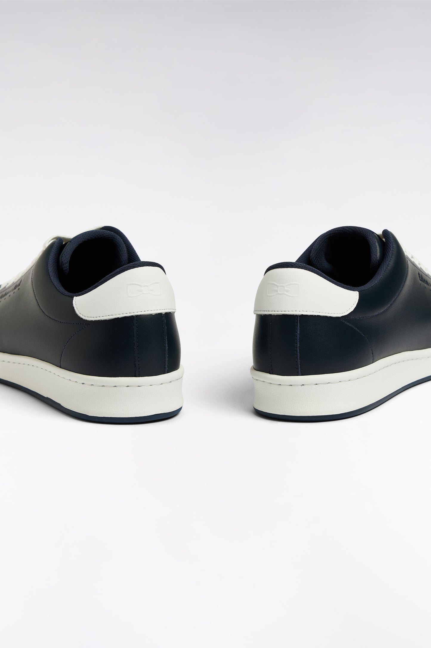 Black leather low-top sneakers