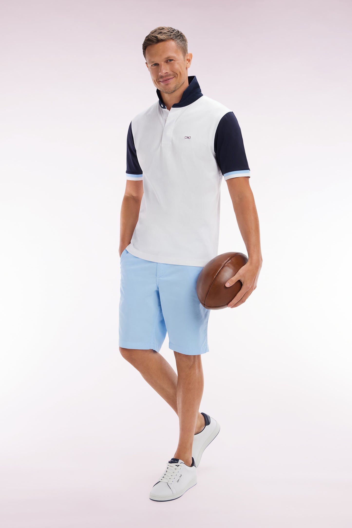 Straight-cut short-sleeved rugby shirt in navy and white cotton with back embroidery