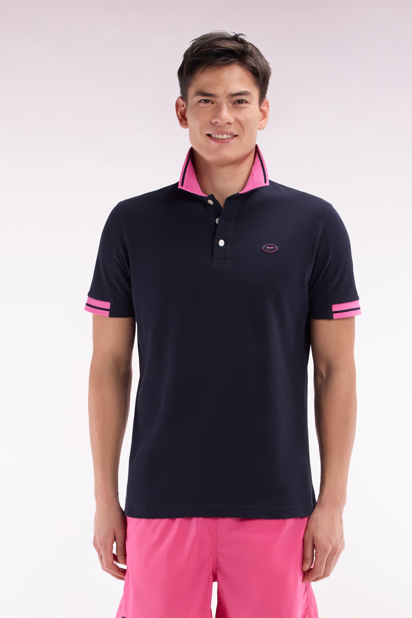 Relaxed-fit short-sleeved polo shirt in pink cotton with colorful accents
