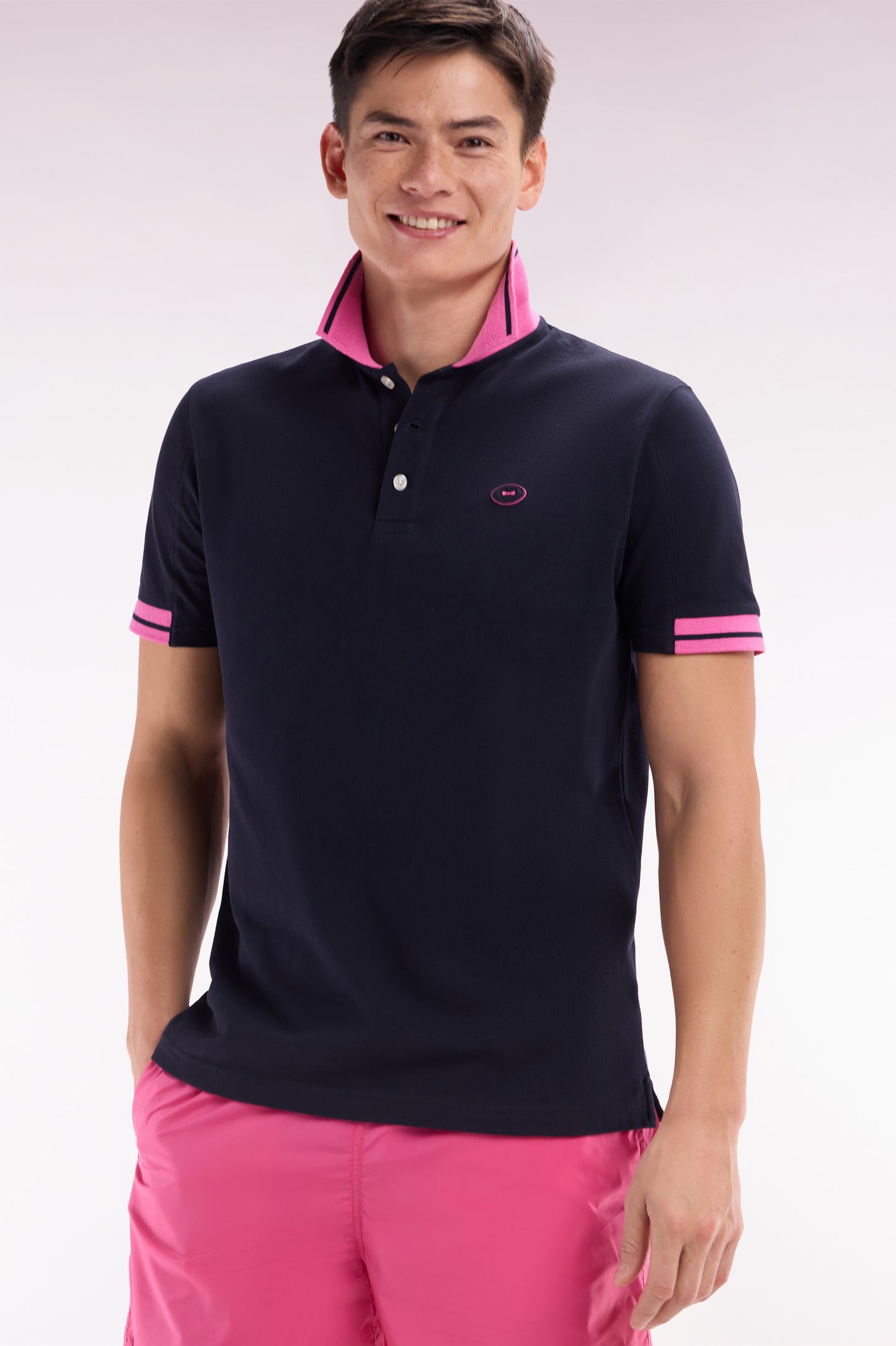 Relaxed-fit short-sleeved polo shirt in pink cotton with colorful accents