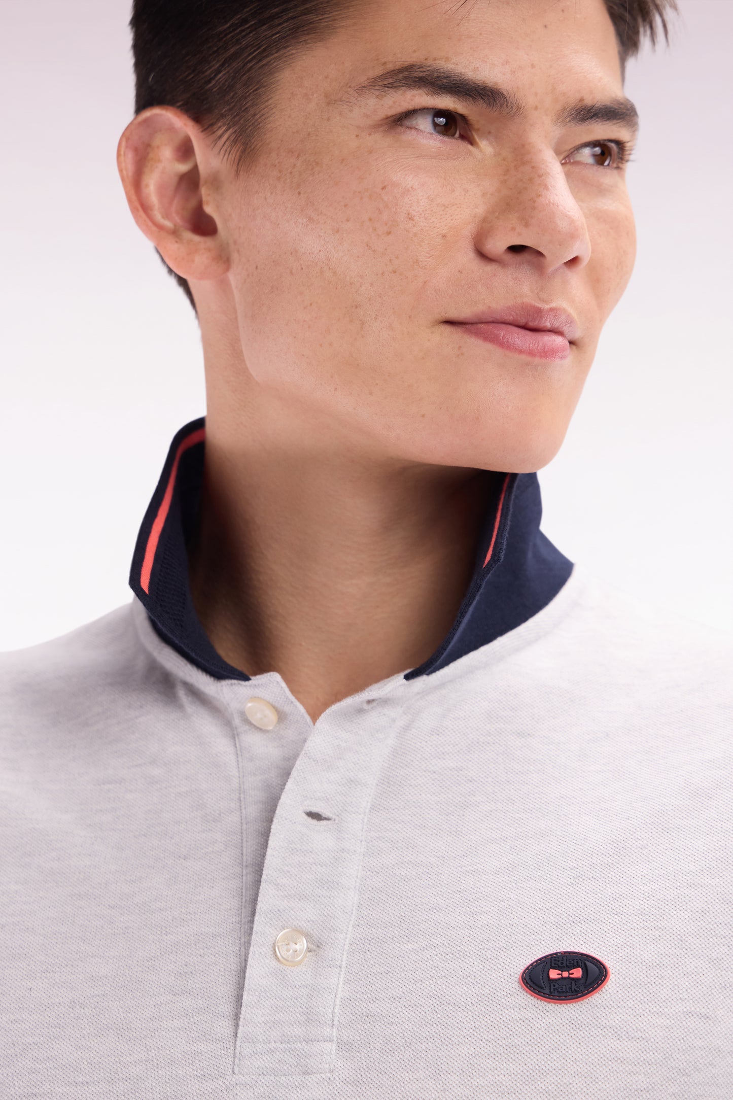 Relaxed-fit short-sleeved polo shirt in red cotton with colorful accents