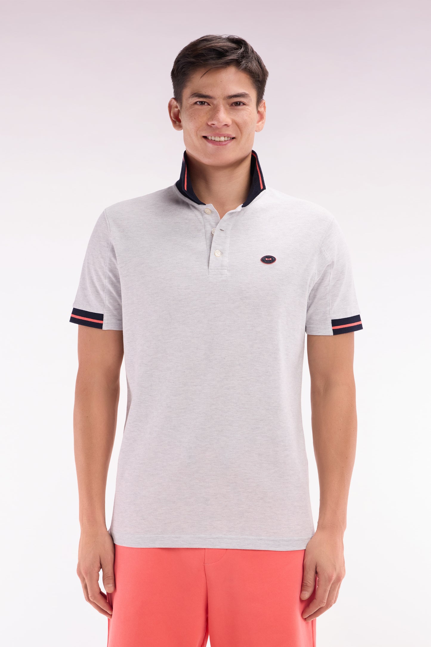 Relaxed-fit short-sleeved polo shirt in red cotton with colorful accents