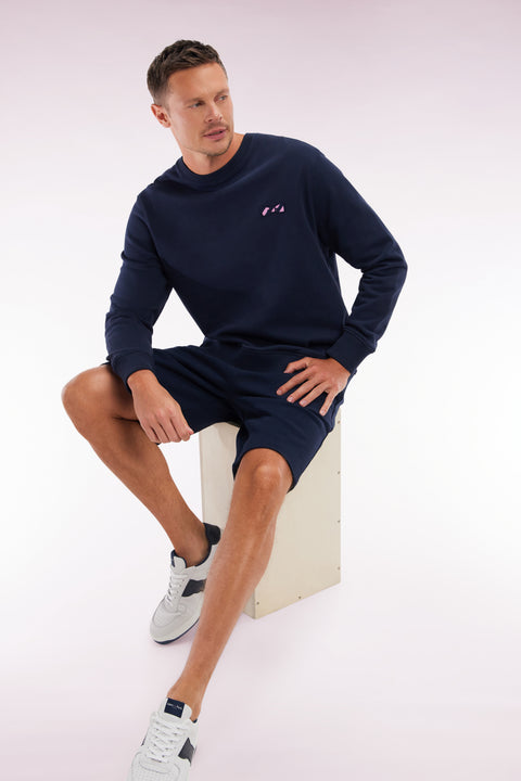 Relaxed-fit navy cotton fleece shorts with a striped bow tie embroidery - Image 3