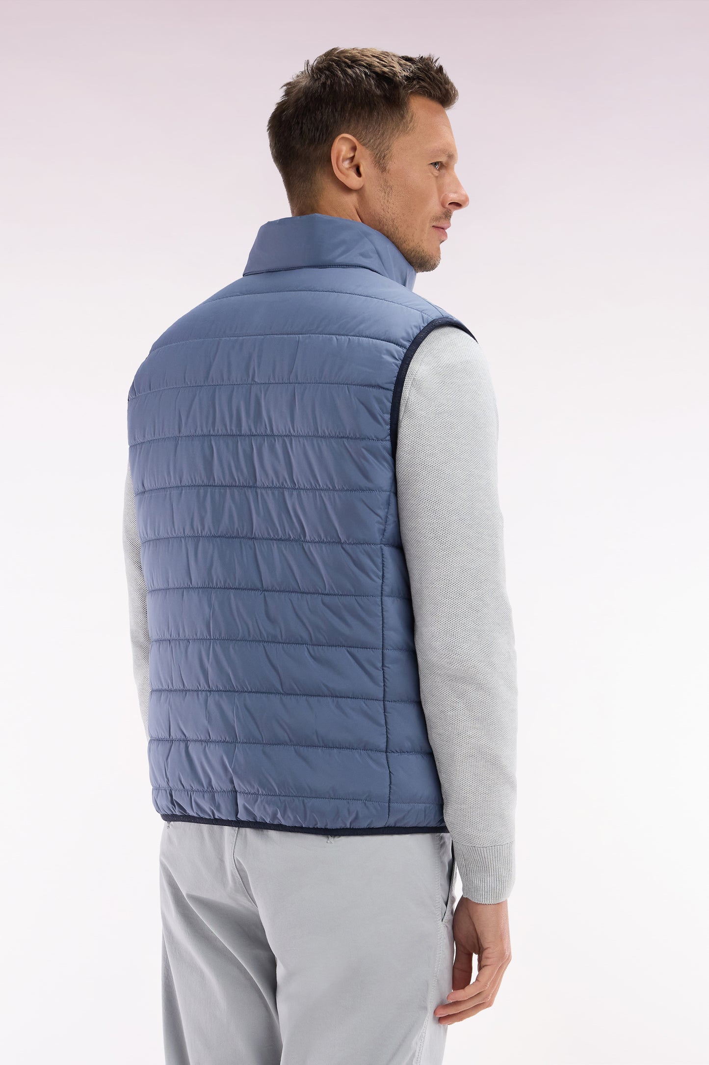 Sleeveless grey down jacket