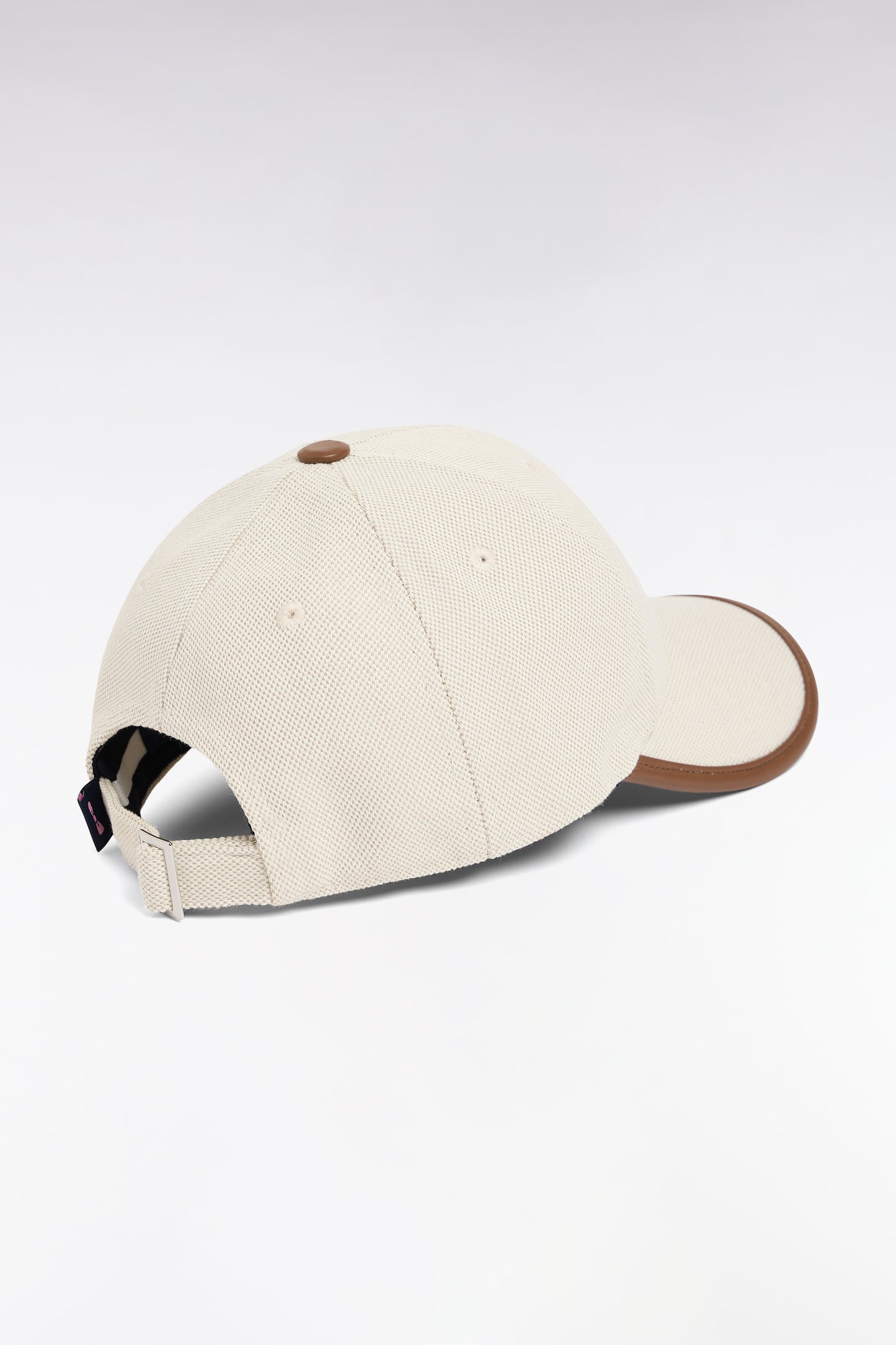 Casquette écru à passepoil marron