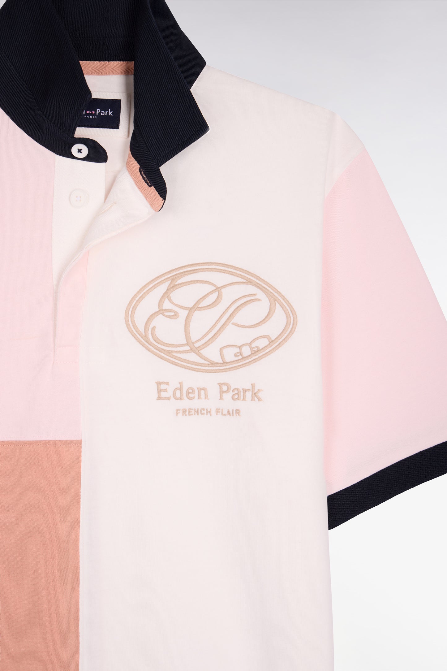 Pink short-sleeved jersey with graphic cutouts and regular-fit embroidery