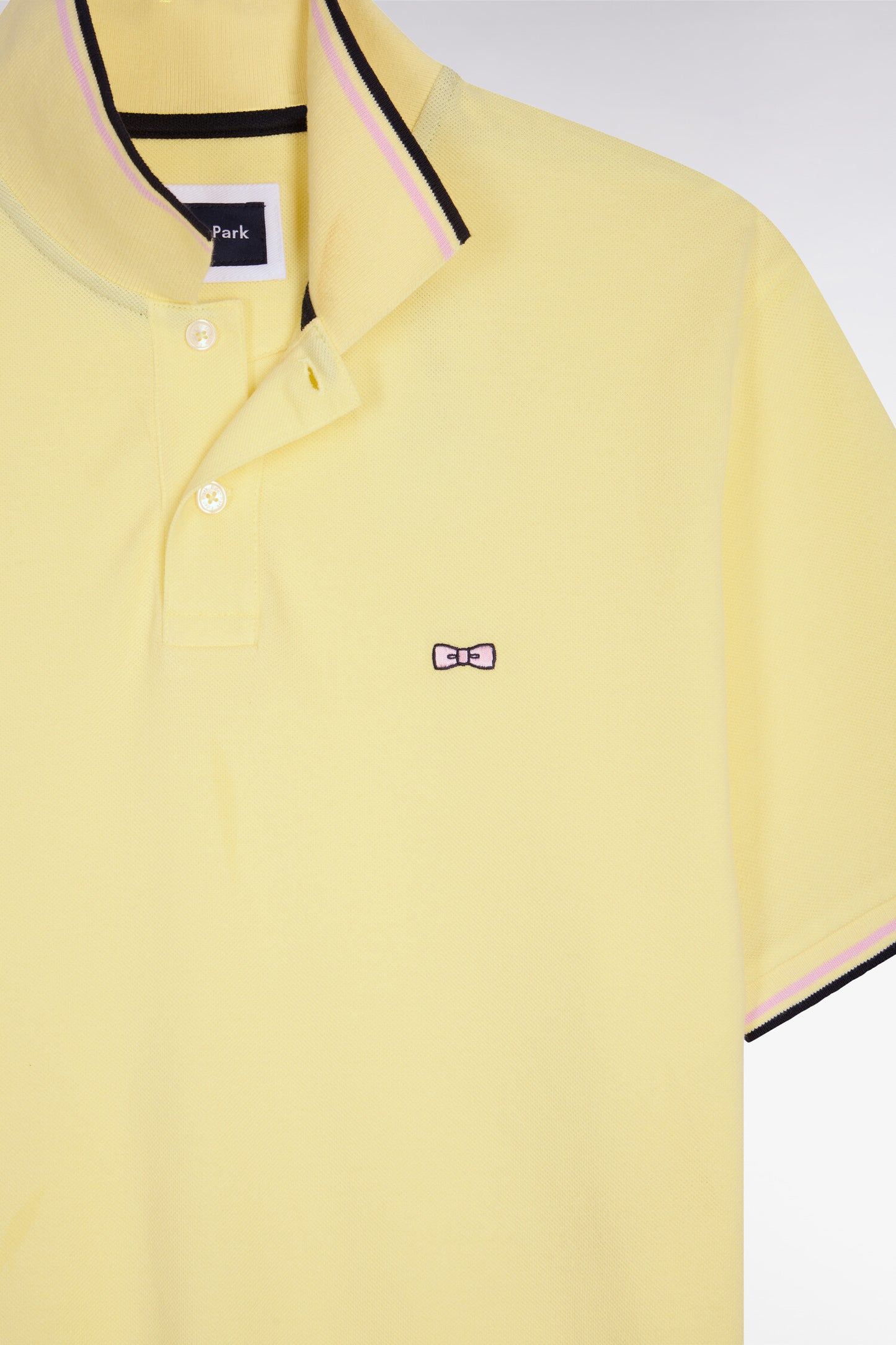 Short-sleeved polo shirt in yellow cotton with striped details, regular fit