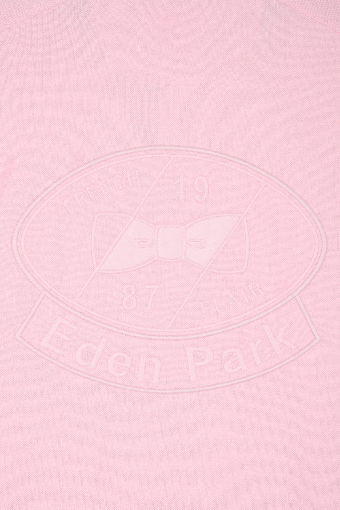 Polo à manches courtes en coton rose brodé coupe regular