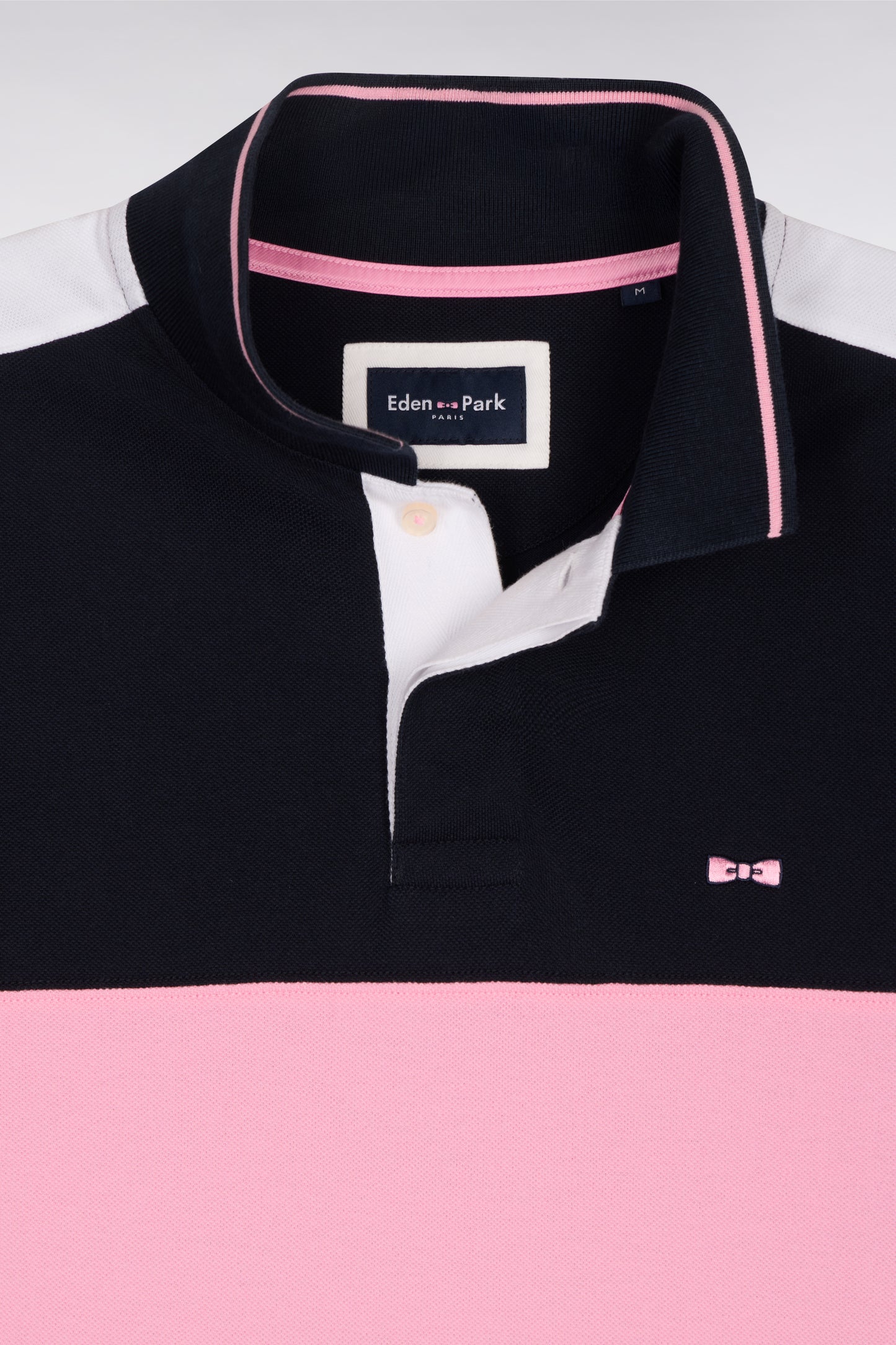 Short-sleeved navy cotton pique polo shirt cut and sewn