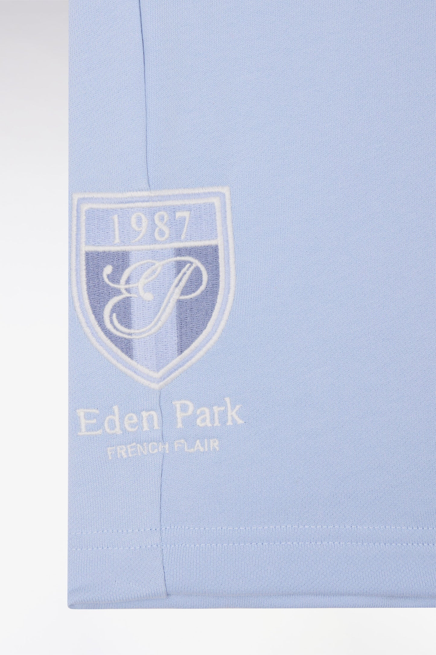Sky cotton fleece shorts with coat of arms embroidery