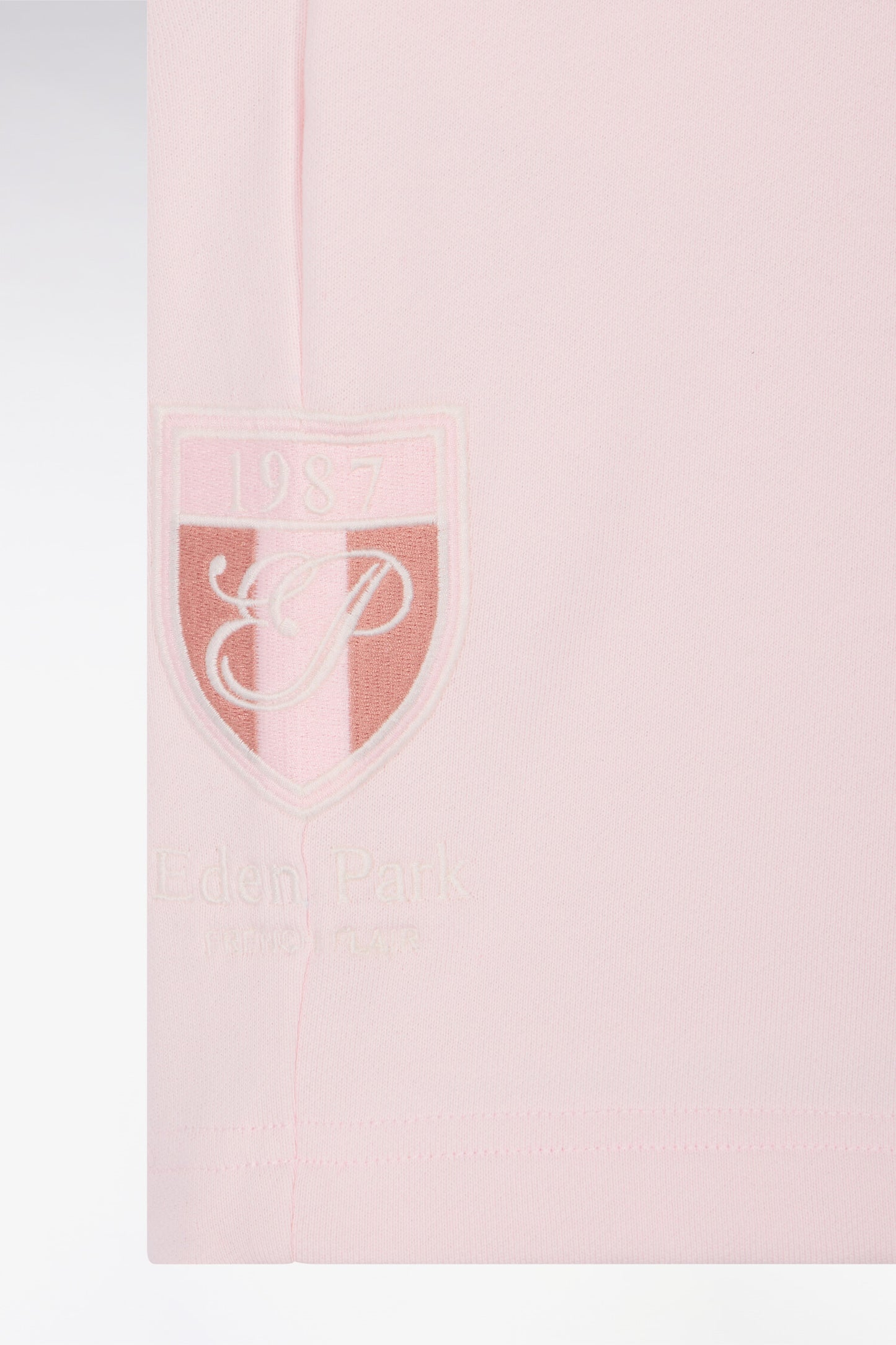 Pink cotton fleece shorts with crest embroidery