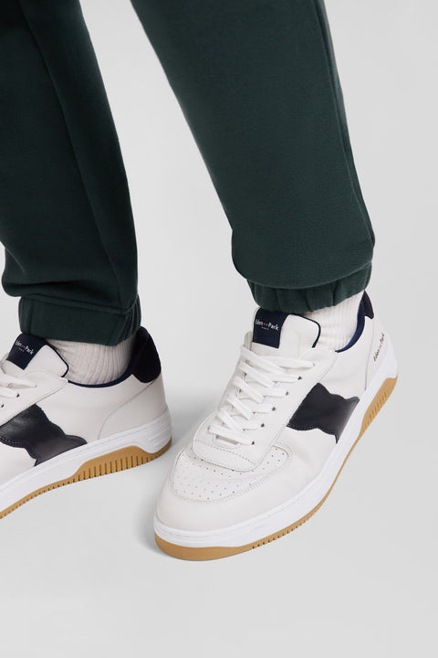White low-top leather sneakers with navy blue cut-out - Image 2