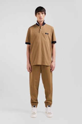 Short-sleeved polo shirt in hazelnut cotton piqué with tricolored details Oversized cut
