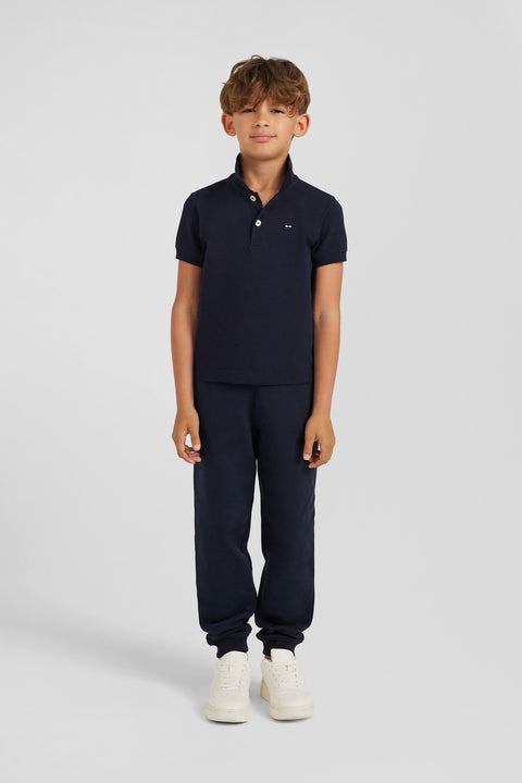 Regular navy blue short-sleeved cotton piqué polo shirt with back bow tie embroidery - Image 1