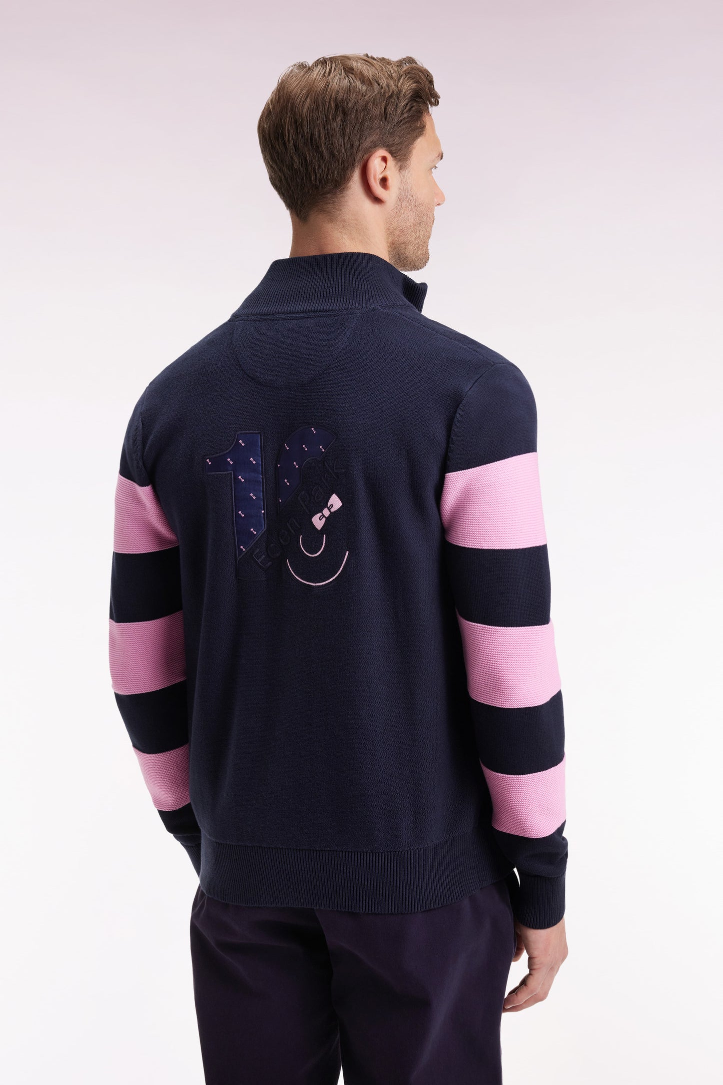 Navy cotton zipped cardigan with stripes of pink sleeves, straight cut