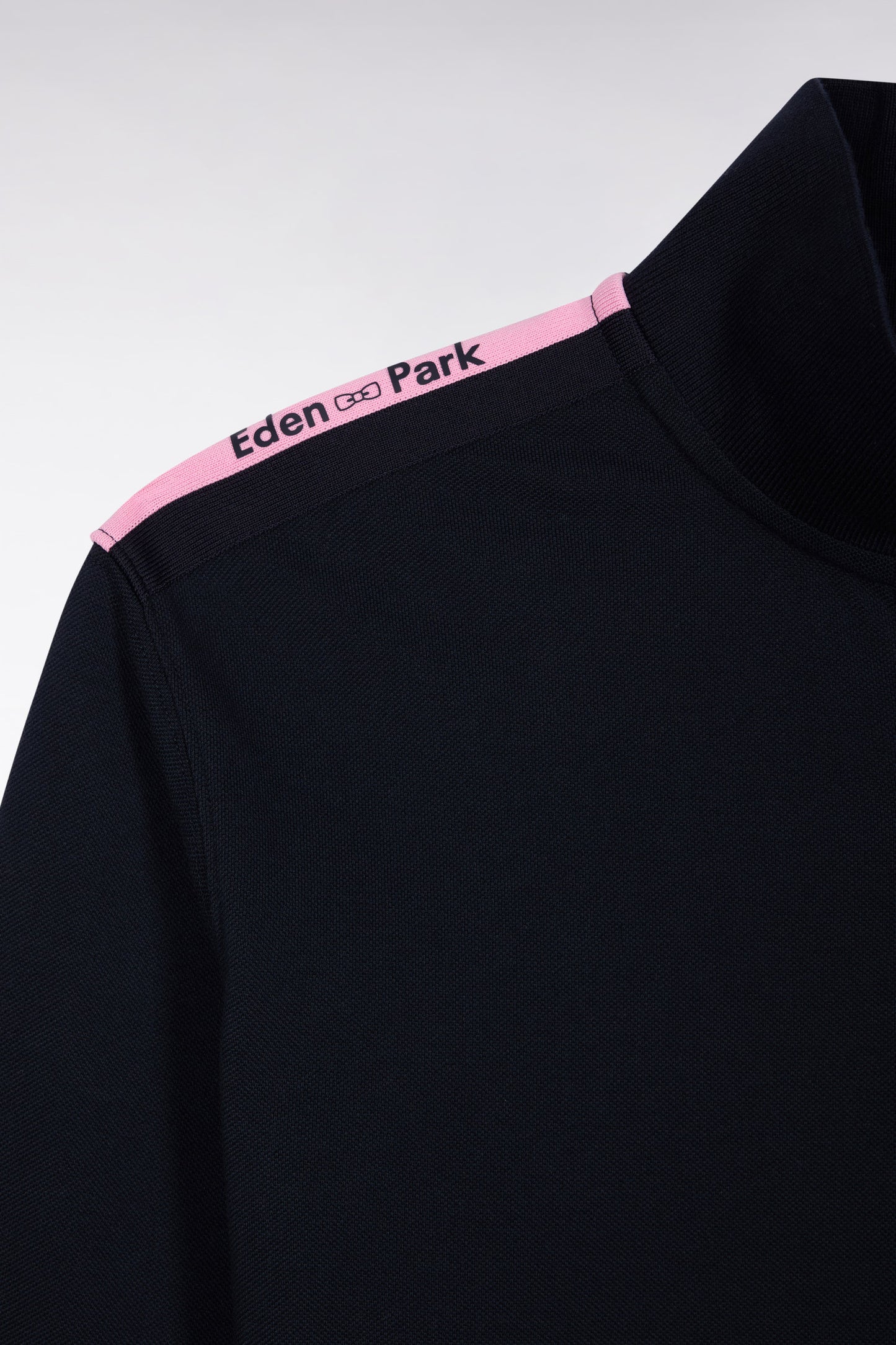 Long-sleeved polo shirt in navy cotton piqué with pink ribbon logo
