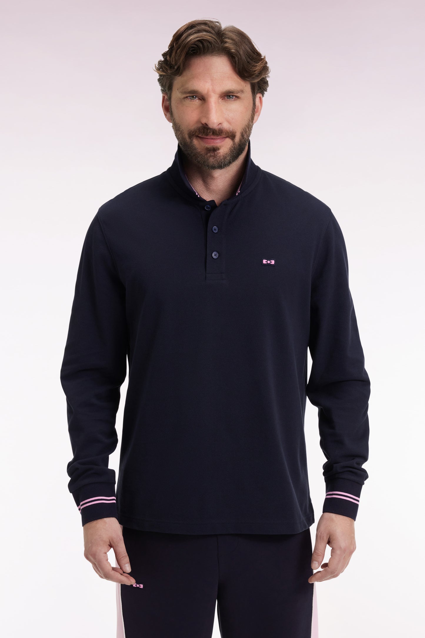 Long-sleeved polo shirt in navy cotton piqué with striped collar.