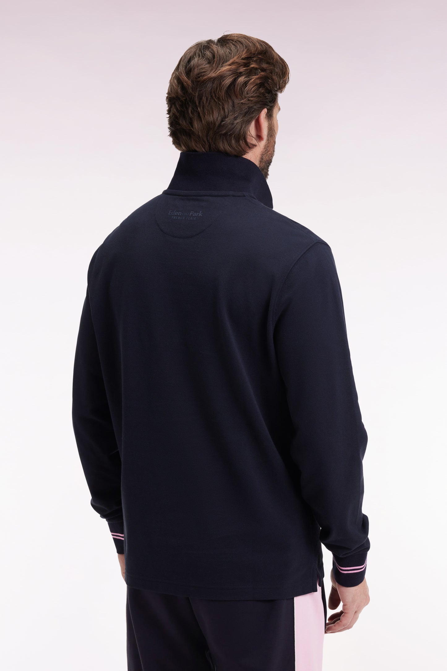 Long-sleeved polo shirt in navy cotton piqué with striped collar.