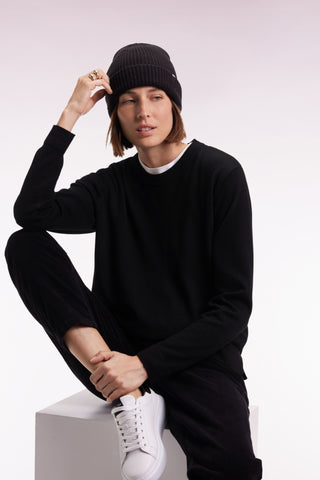 Round-neck sweater in black merino wool