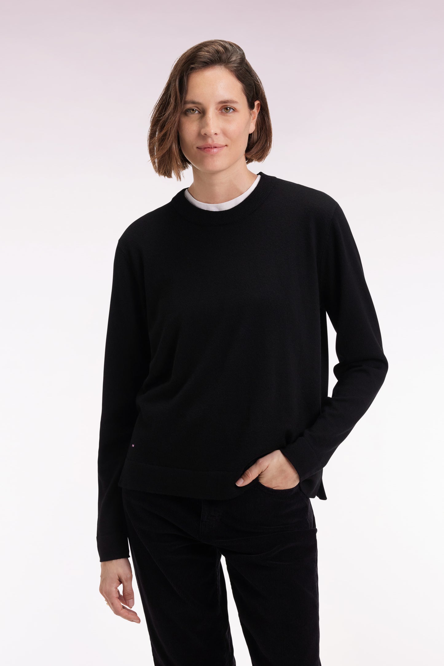 Round-neck sweater in black merino wool
