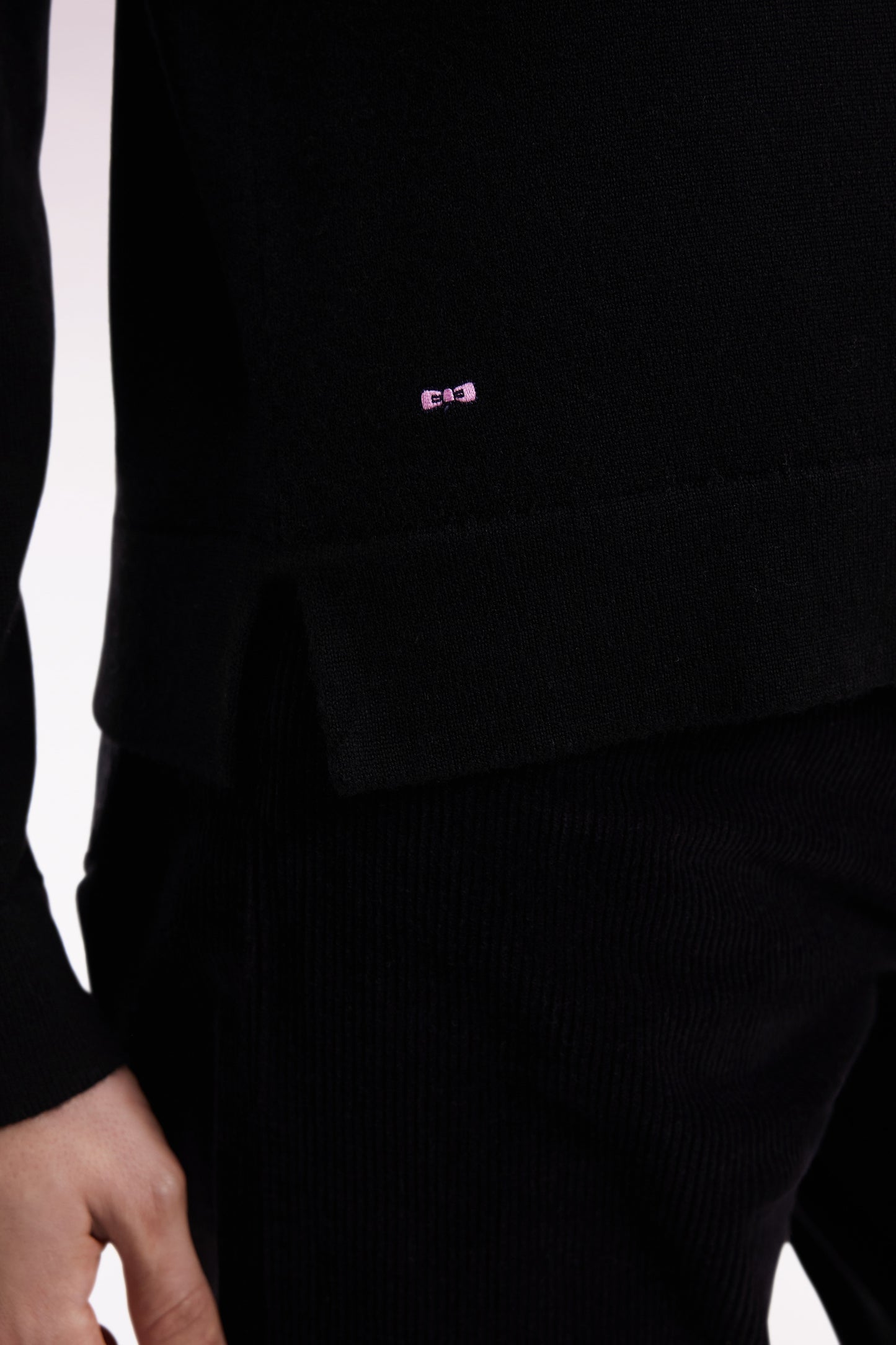 Round-neck sweater in black merino wool