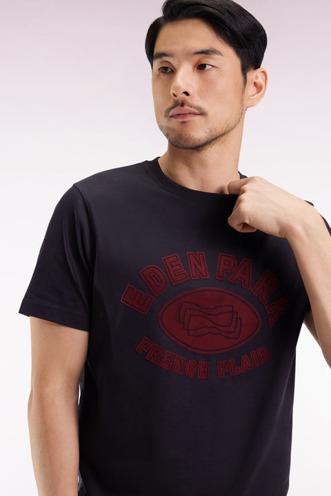 Short-sleeved T-shirt in black cotton with velvet-effect print - Image 1