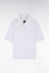 Short-sleeved white cotton polo shirt with oversized cut