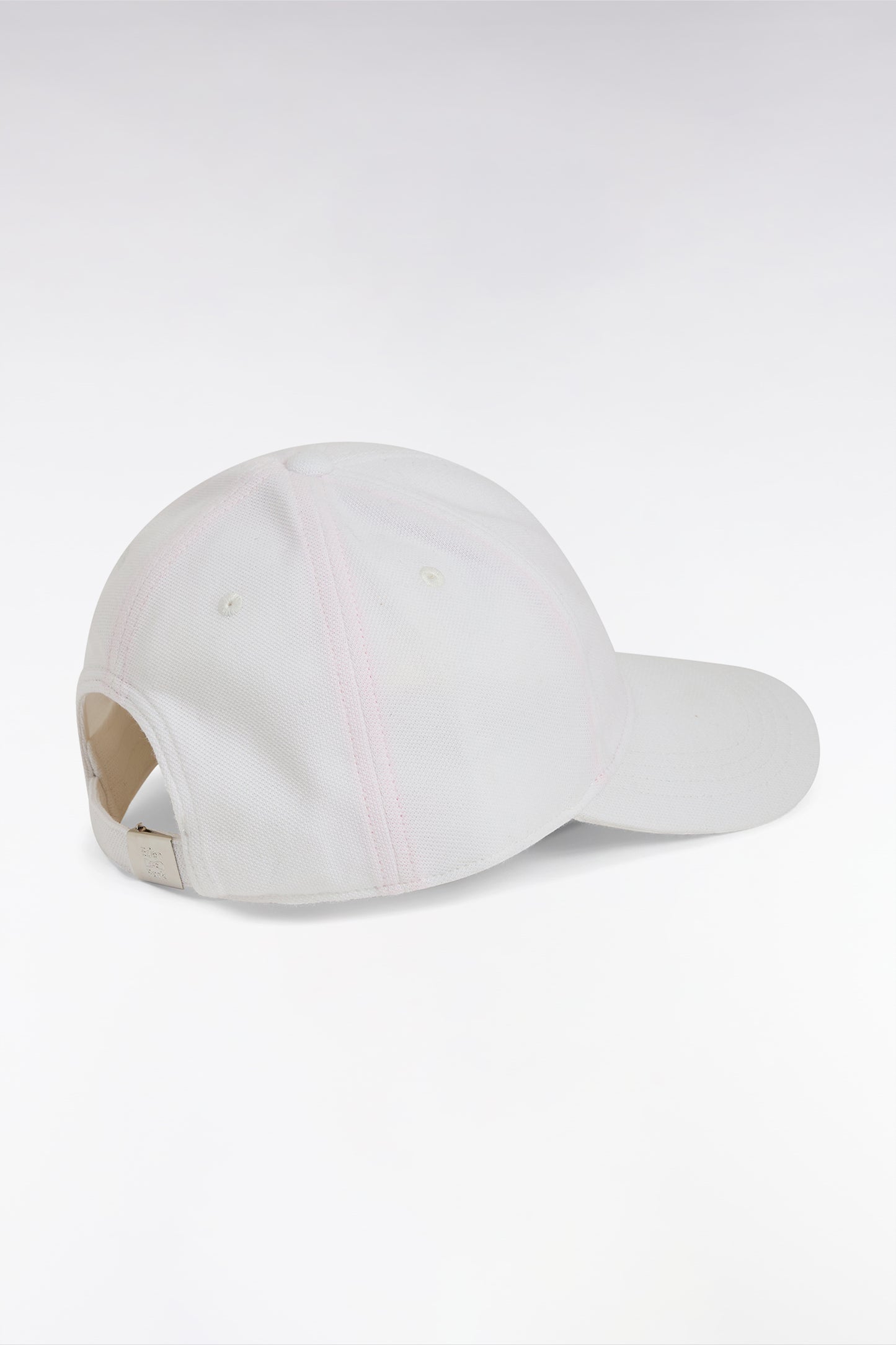 White cotton piqué cap with bow tie embroidery