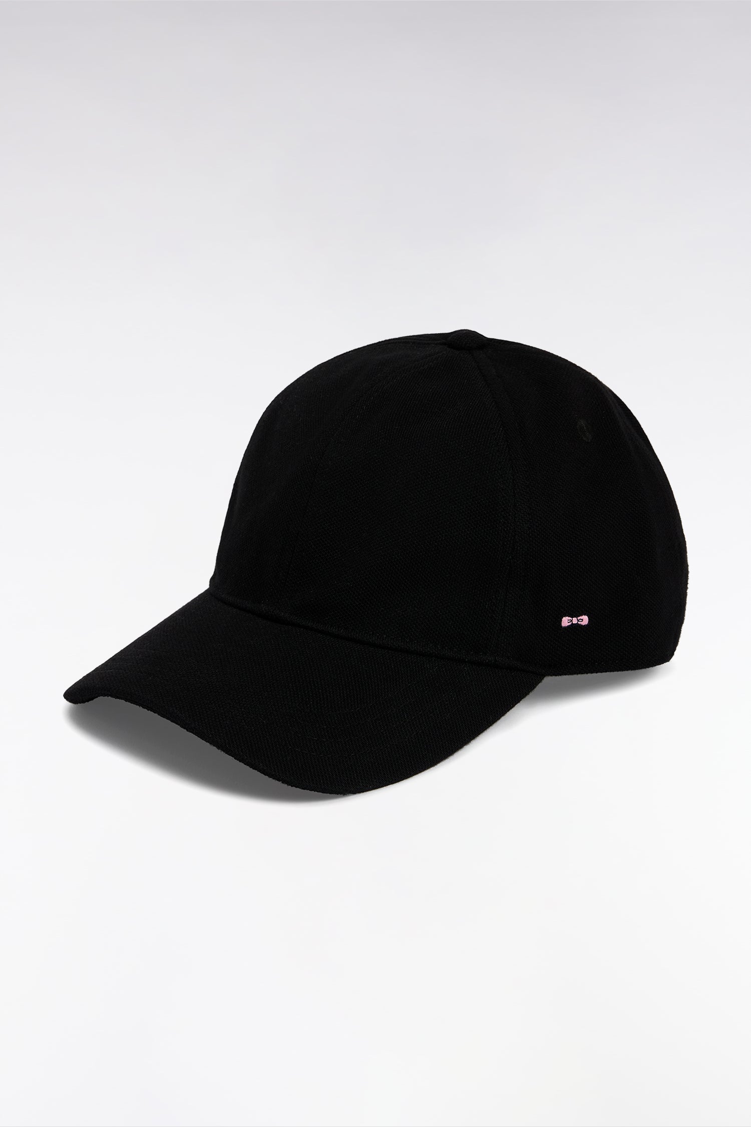 Casquette unie en piqué coton noir broderie nœud papillon