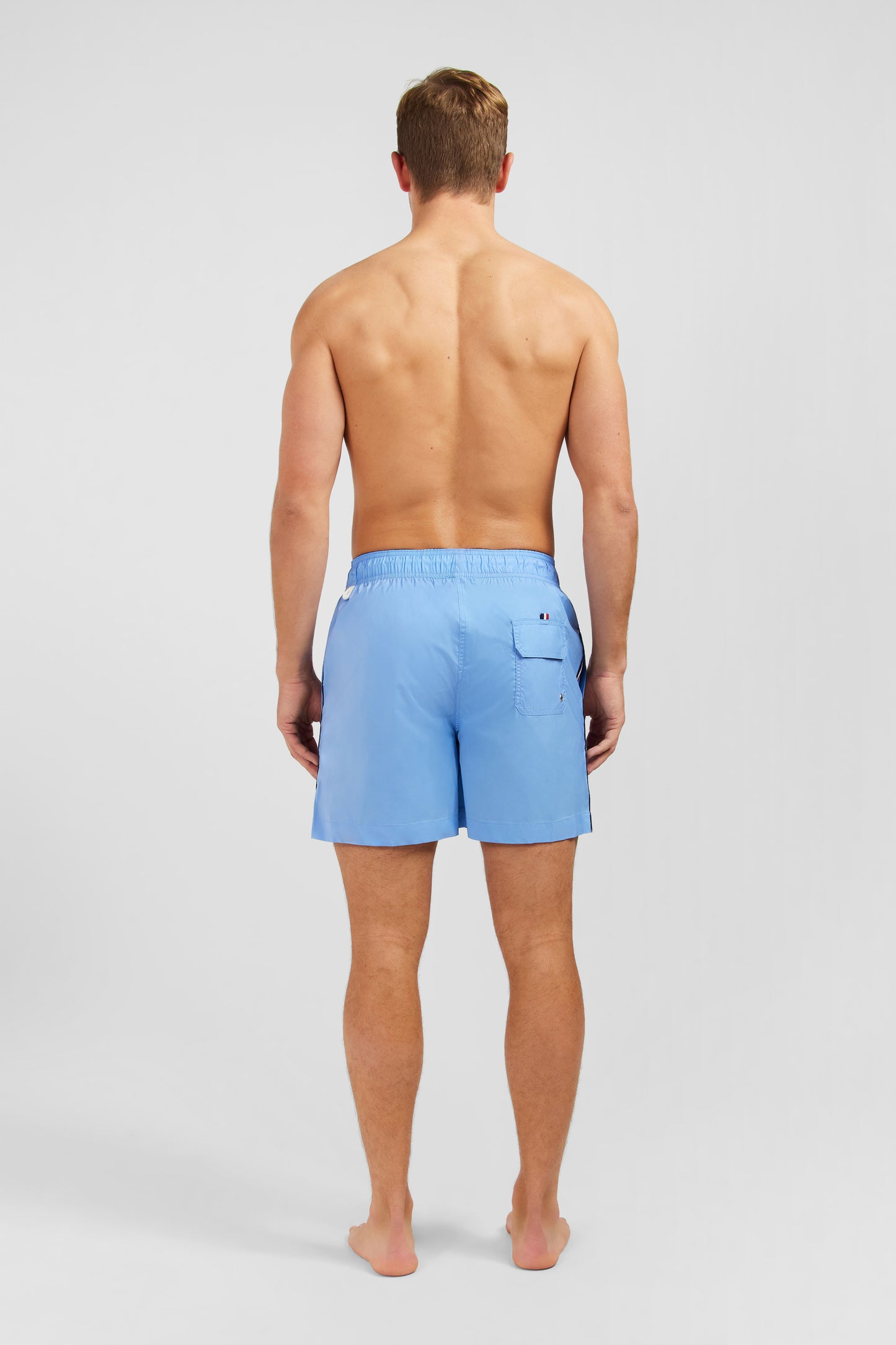 Swim shorts with tricoloured stripes