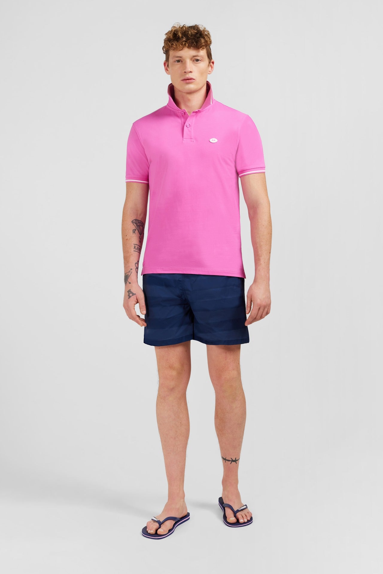 Pink short-sleeved polo shirt