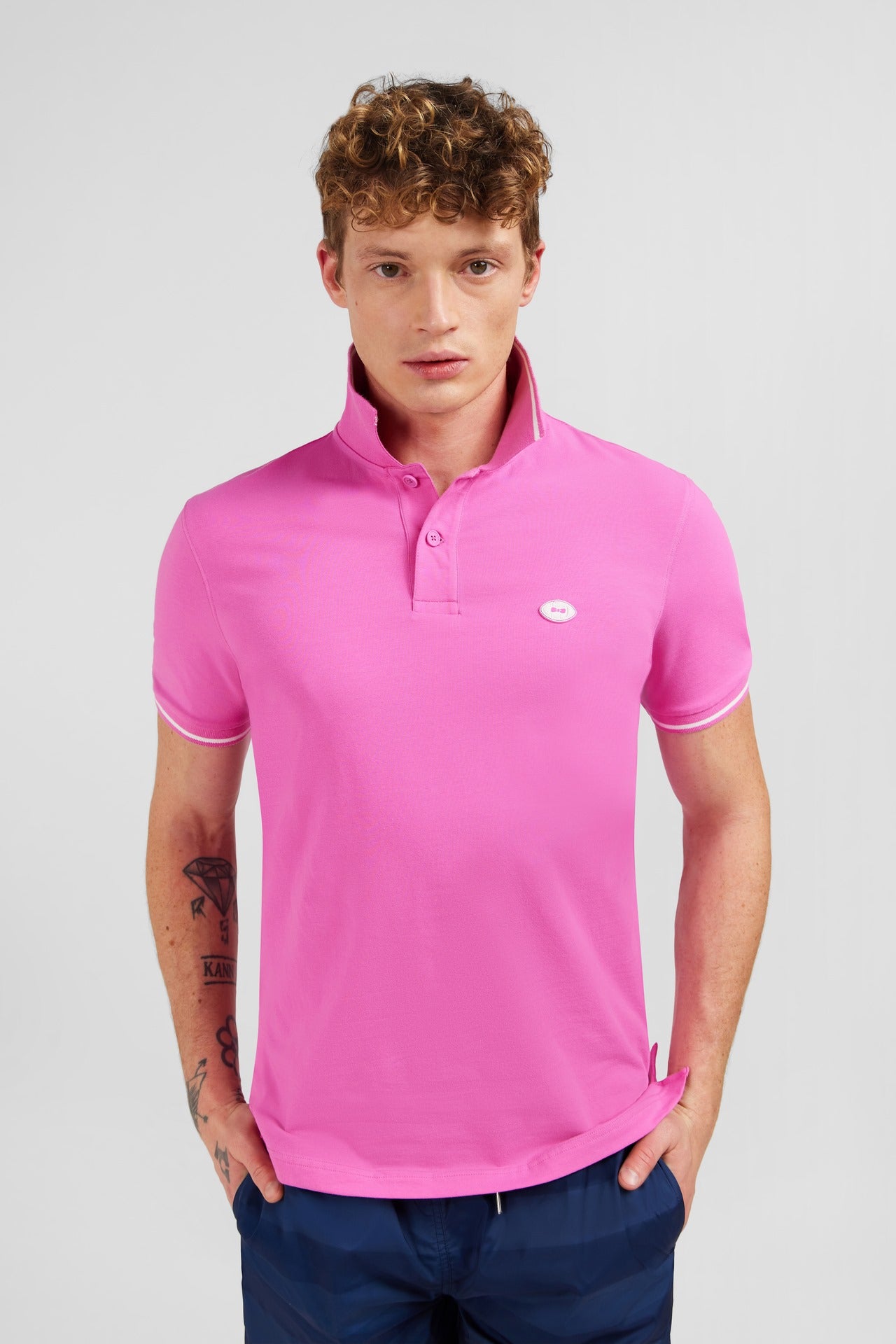 Pink short-sleeved polo shirt