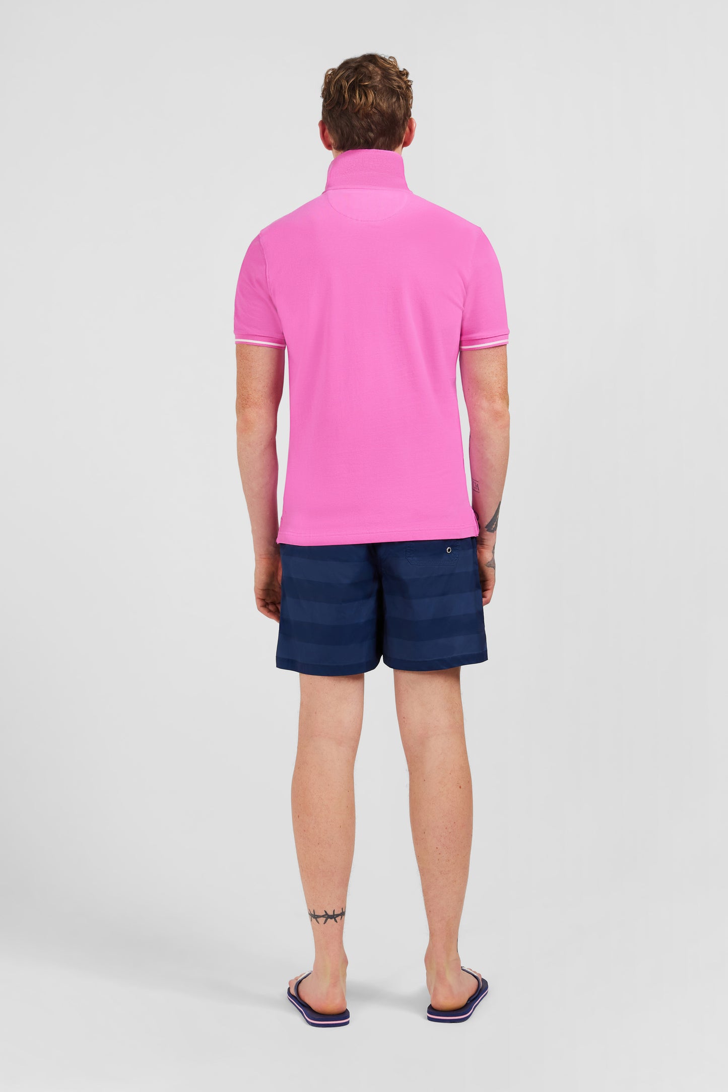 Pink short-sleeved polo shirt