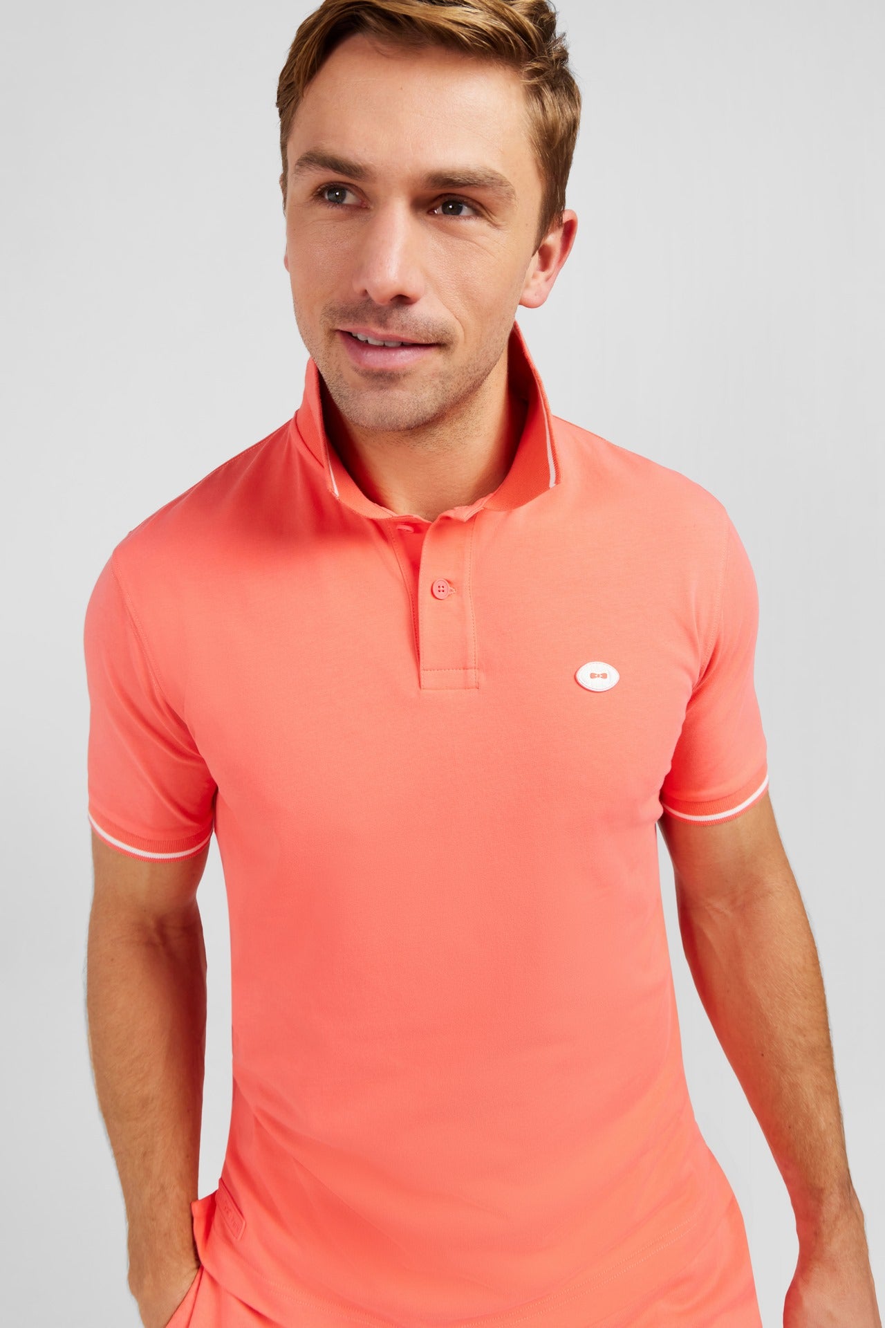 Pink short-sleeved polo shirt
