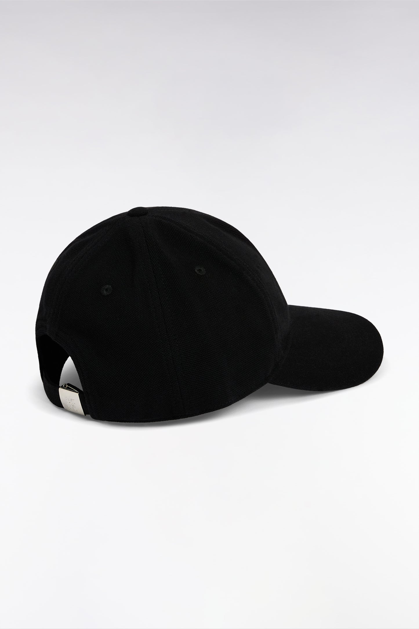 Black cotton piqué cap with bow tie embroidery