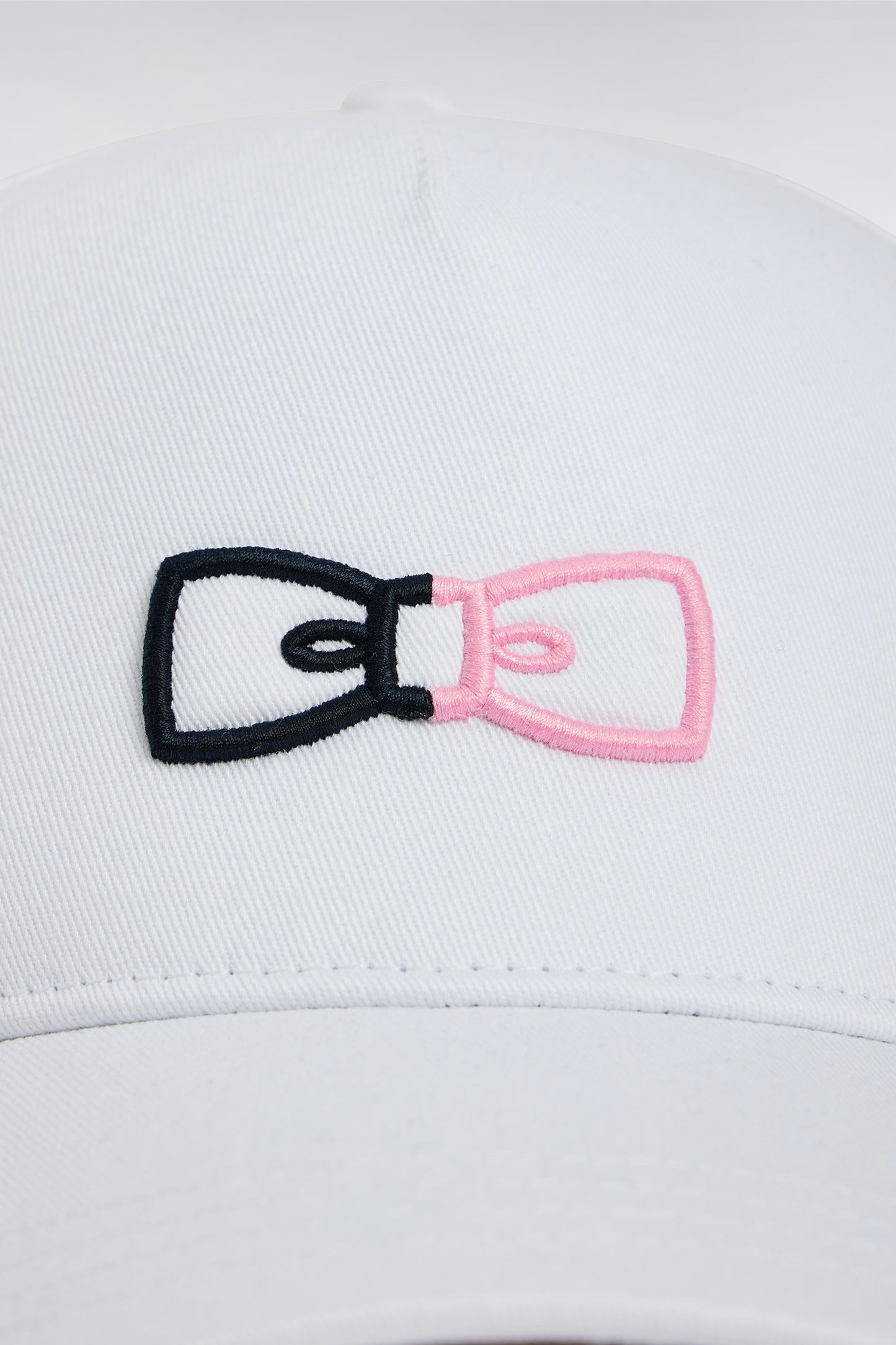 White cotton twill cap with two-tone embroidery