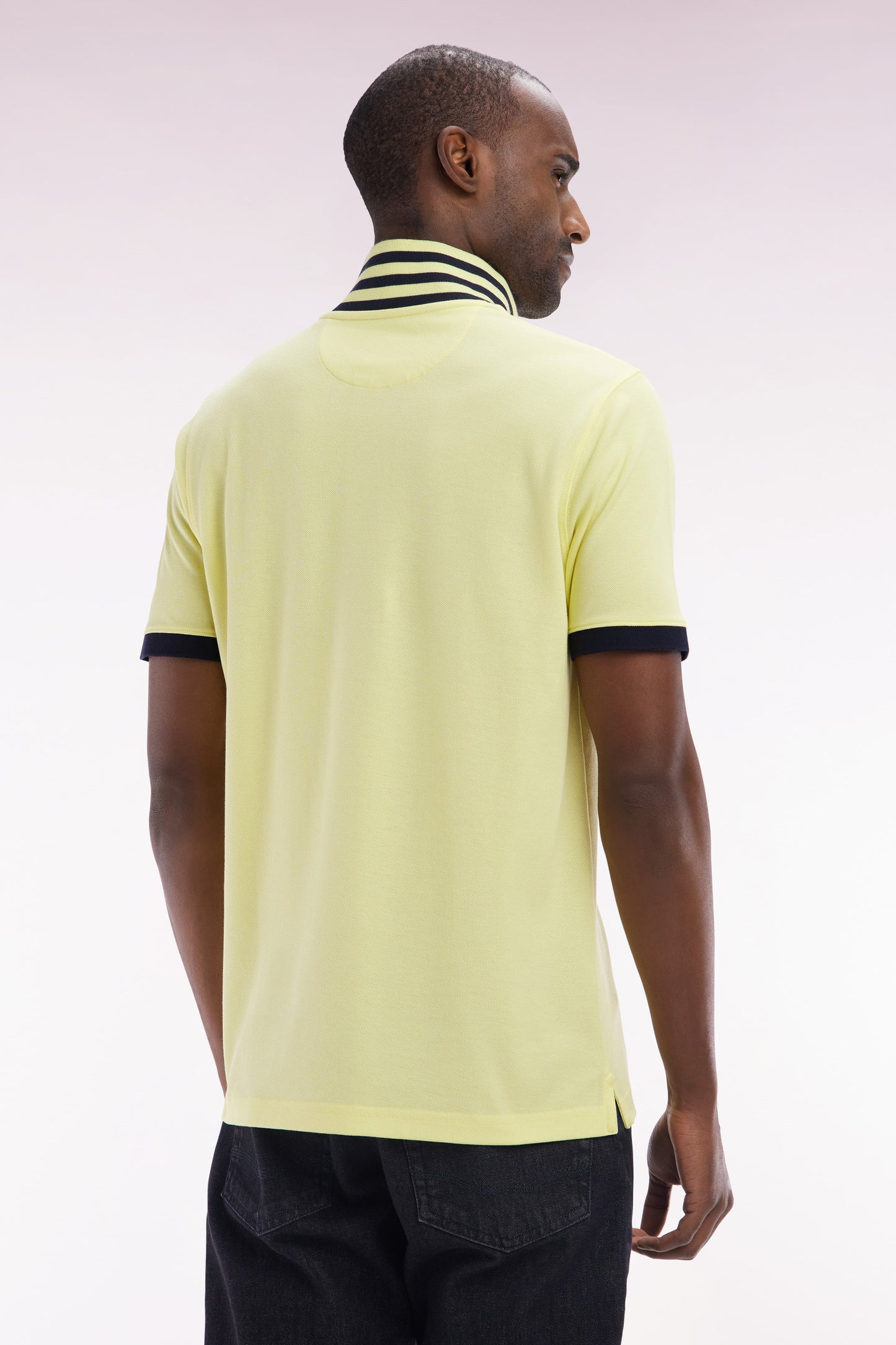 Straight-cut short-sleeved polo shirt in yellow Pima cotton piqué with striped under collar