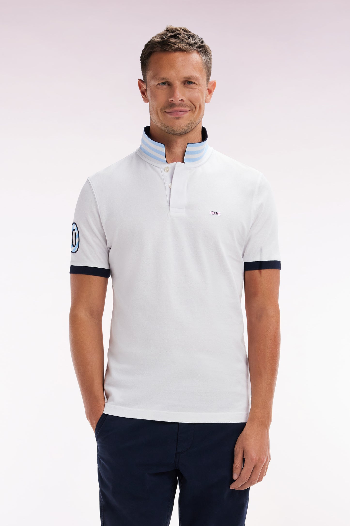 Straight-fit short-sleeved polo shirt in white cotton piqué with 10 sleeves embroidery