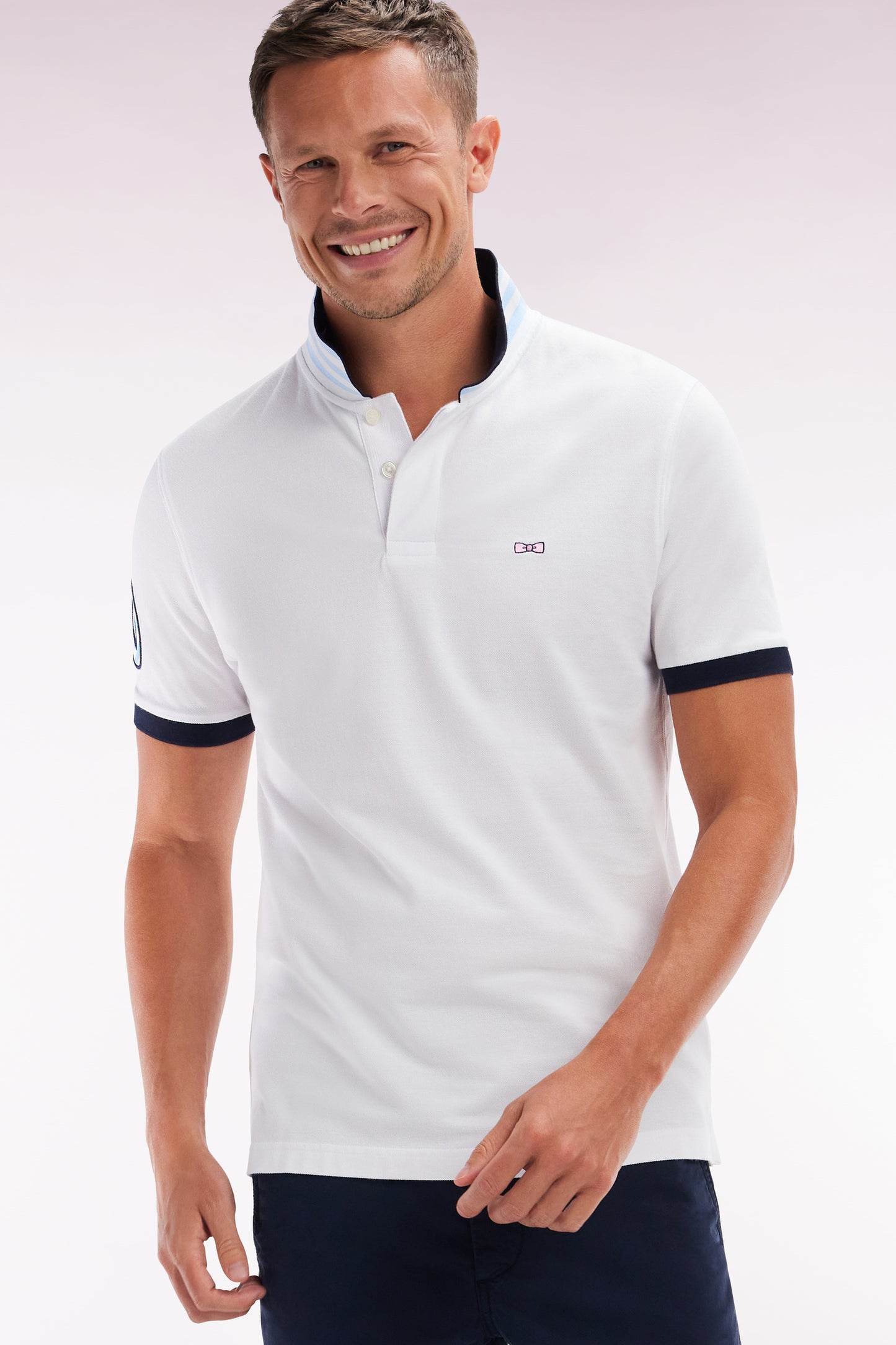 Straight-fit short-sleeved polo shirt in white cotton piqué with 10 sleeves embroidery