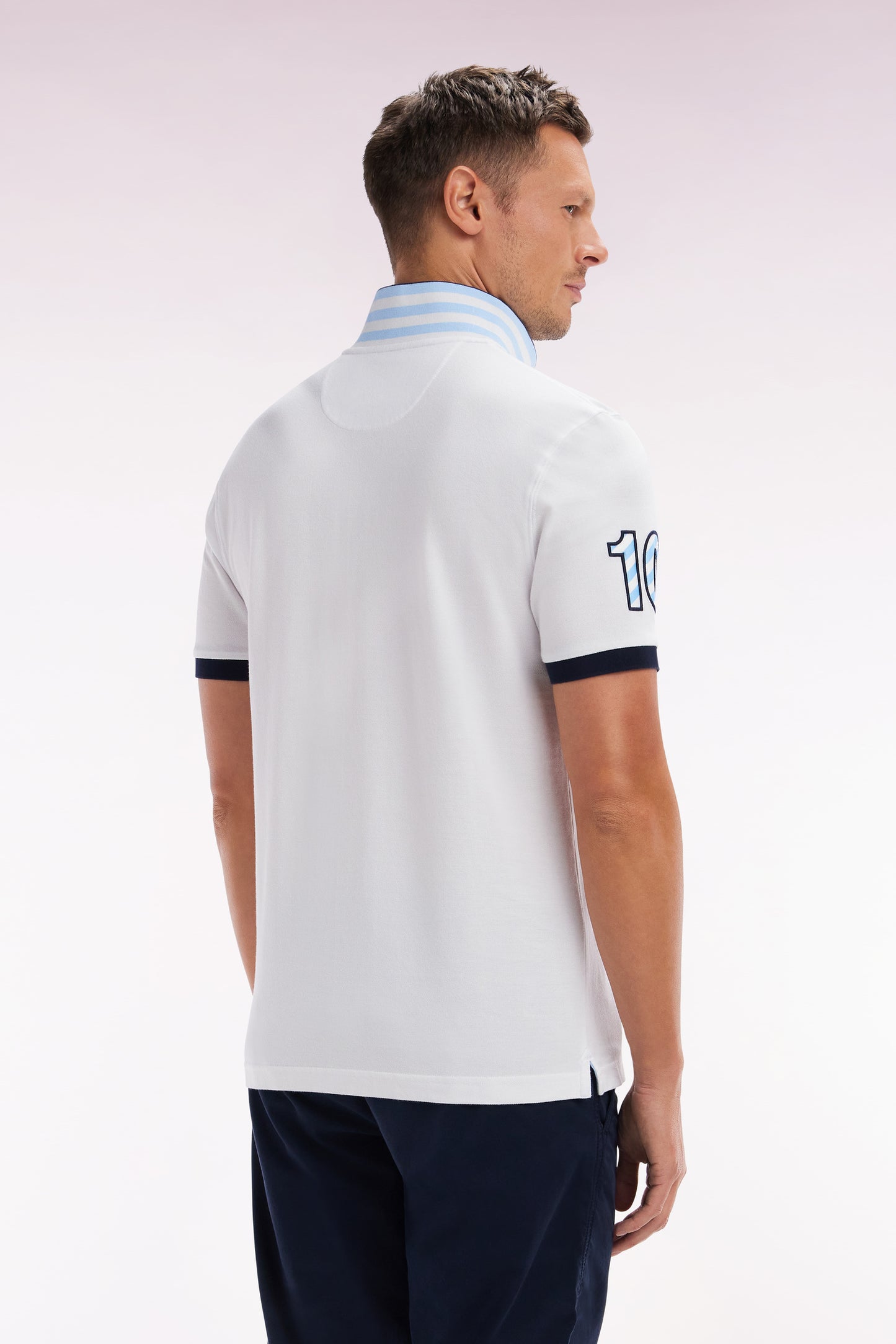 Straight-fit short-sleeved polo shirt in white cotton piqué with 10 sleeves embroidery