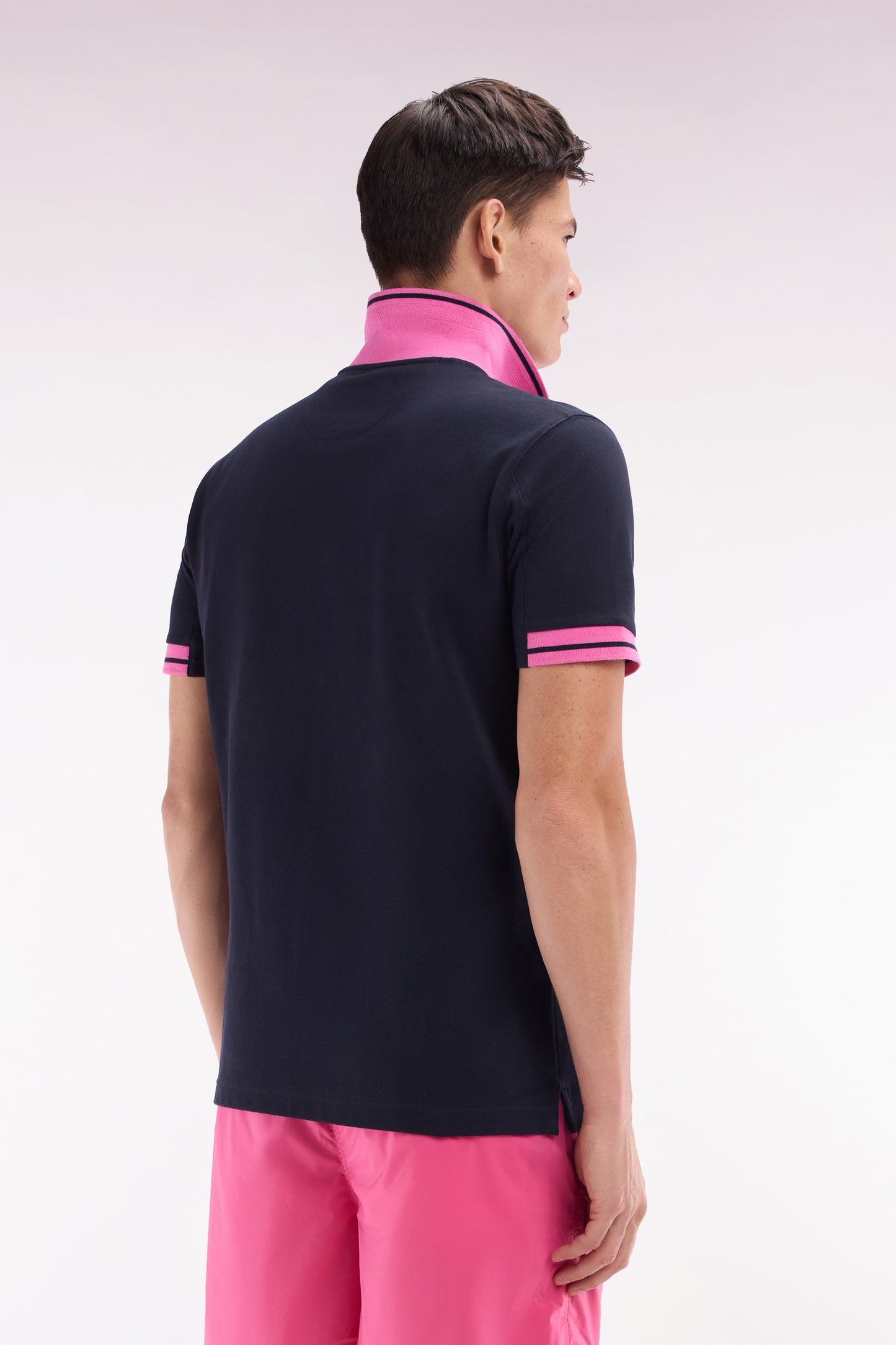 Relaxed-fit short-sleeved polo shirt in pink cotton with colorful accents