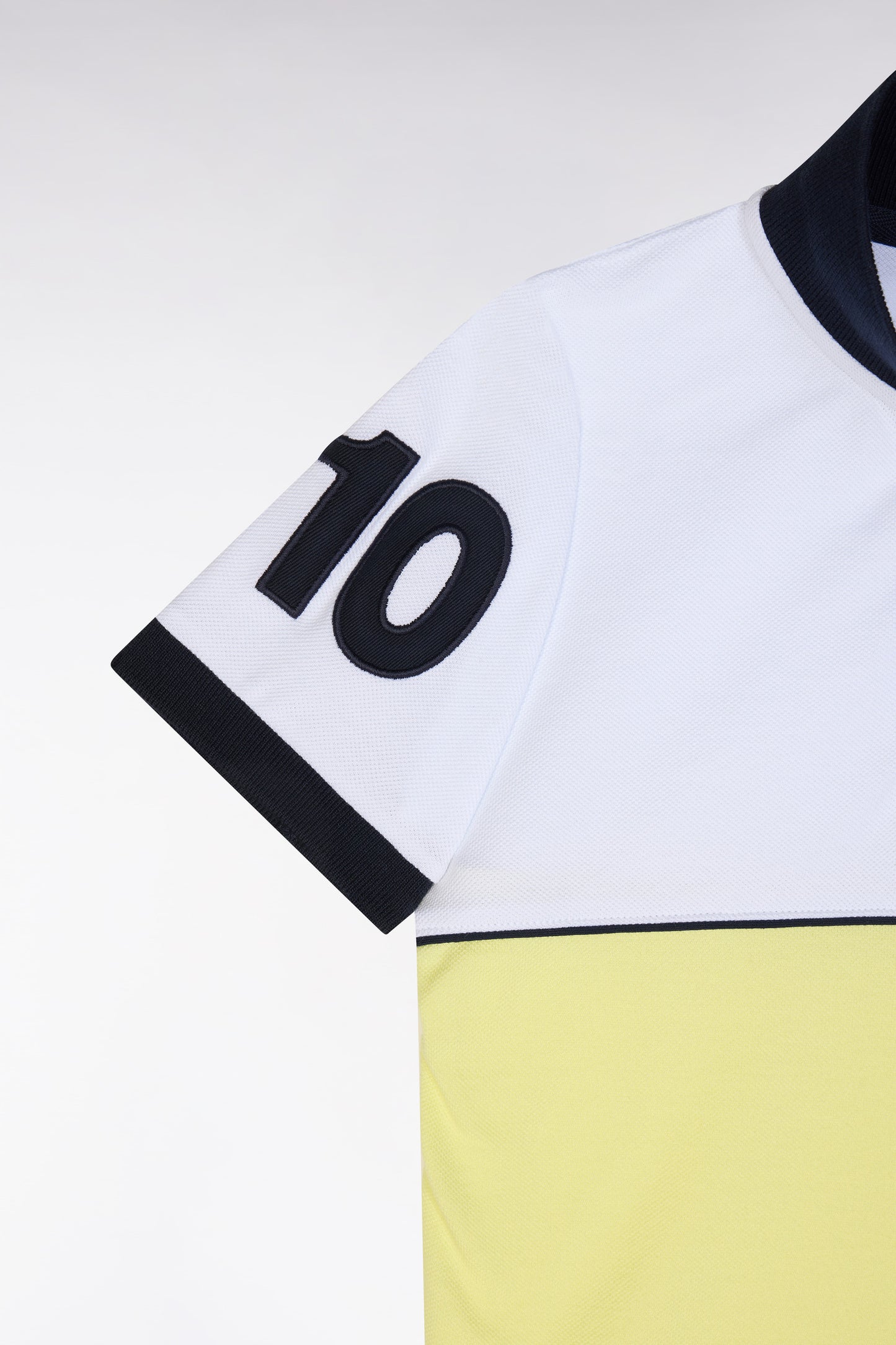 Straight-fit two-tone short-sleeved polo shirt in yellow cotton with number 10 embroidery
