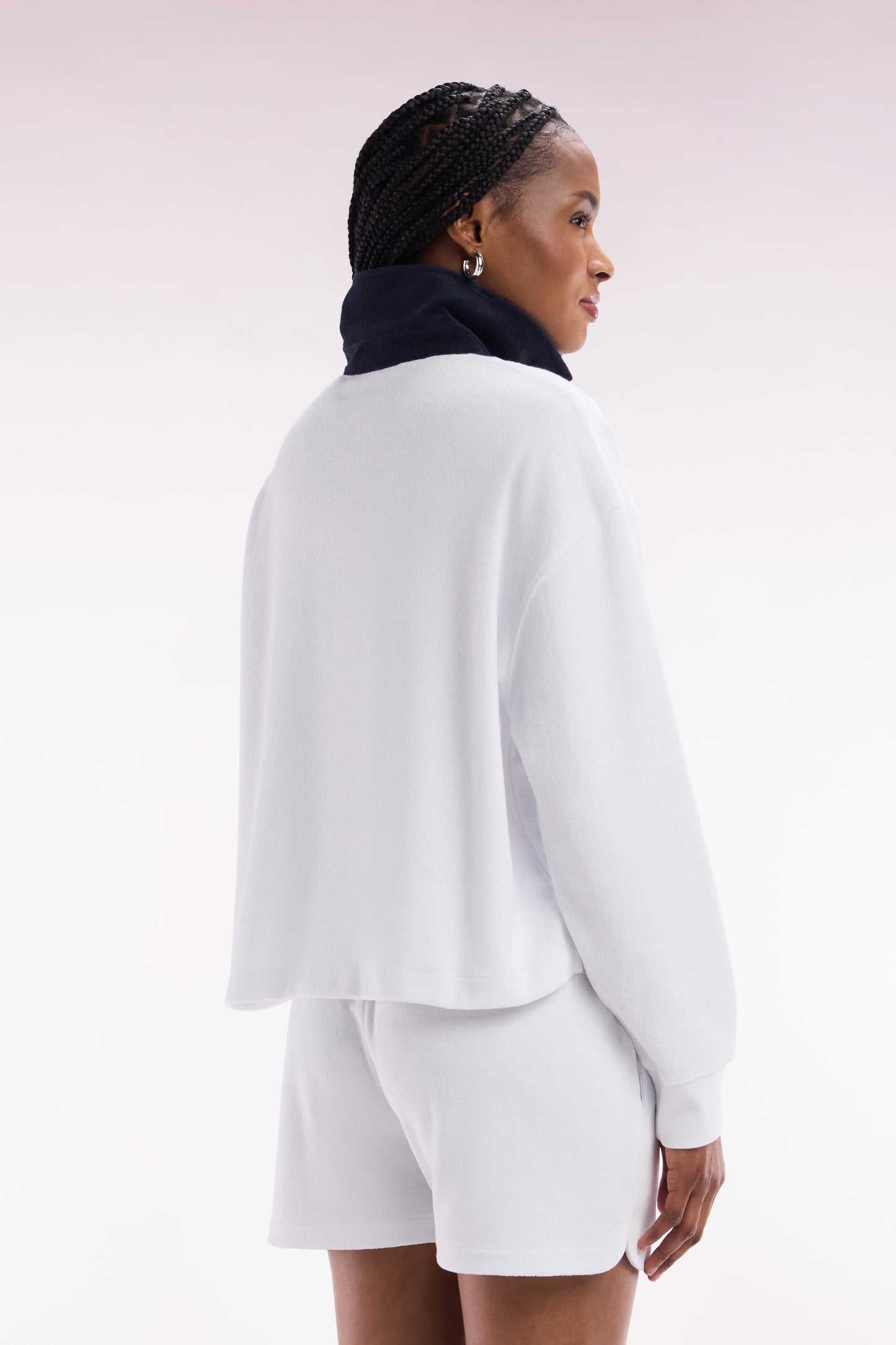 White cotton sweatshirt with navy rugby shirt collar