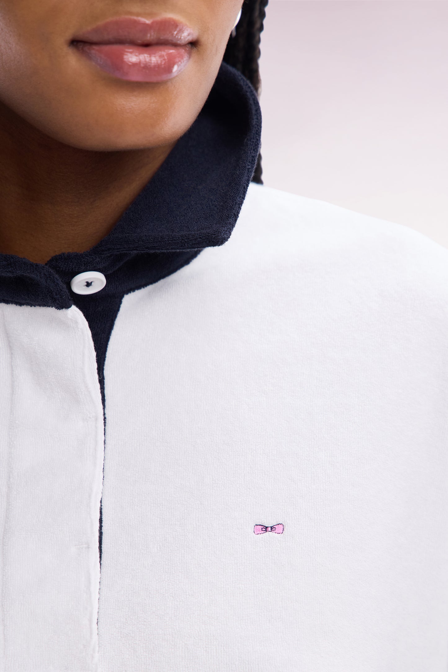 White cotton sweatshirt with navy rugby shirt collar