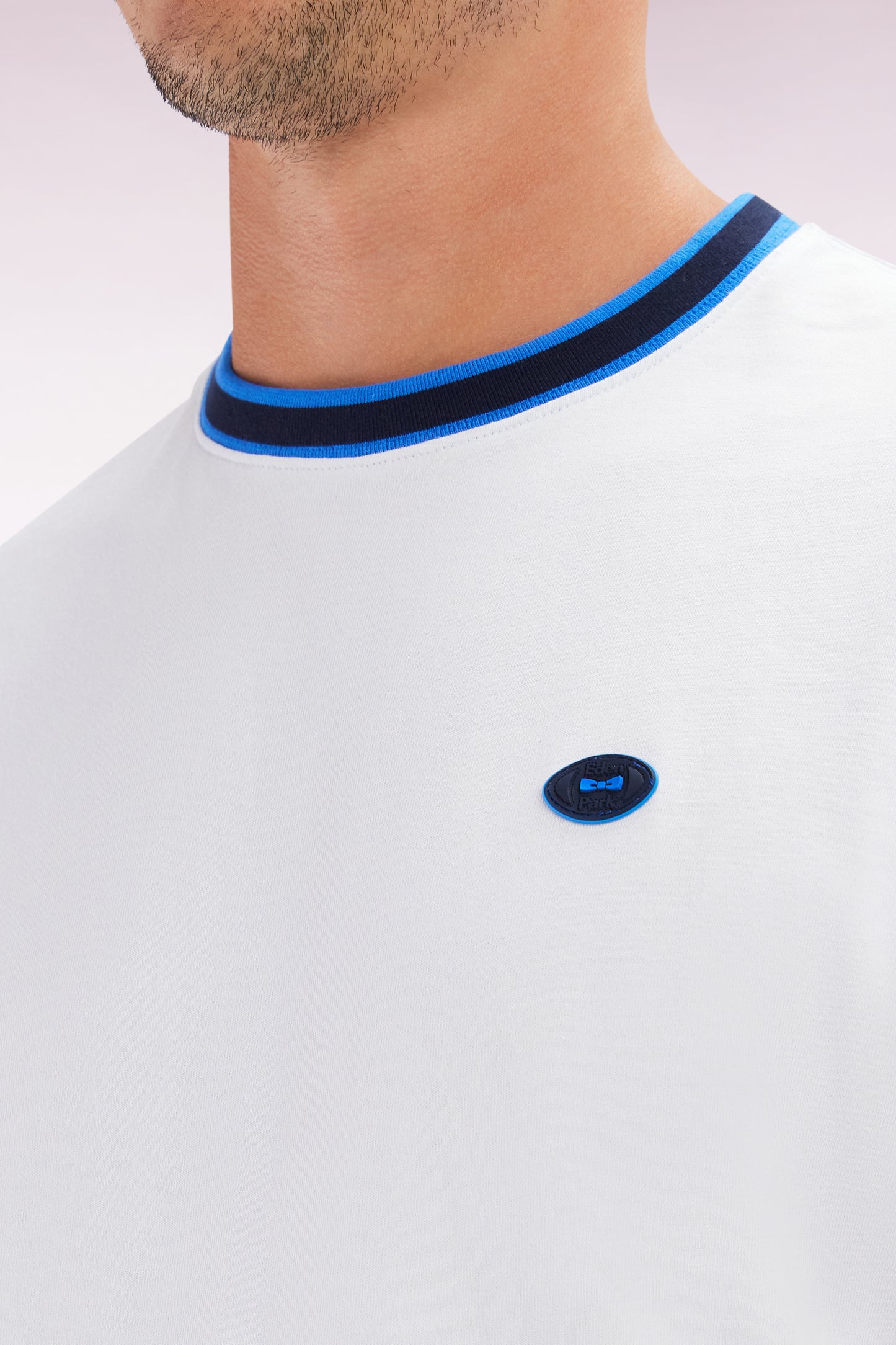 White cotton T-shirt with blue ribbing, relaxed fit