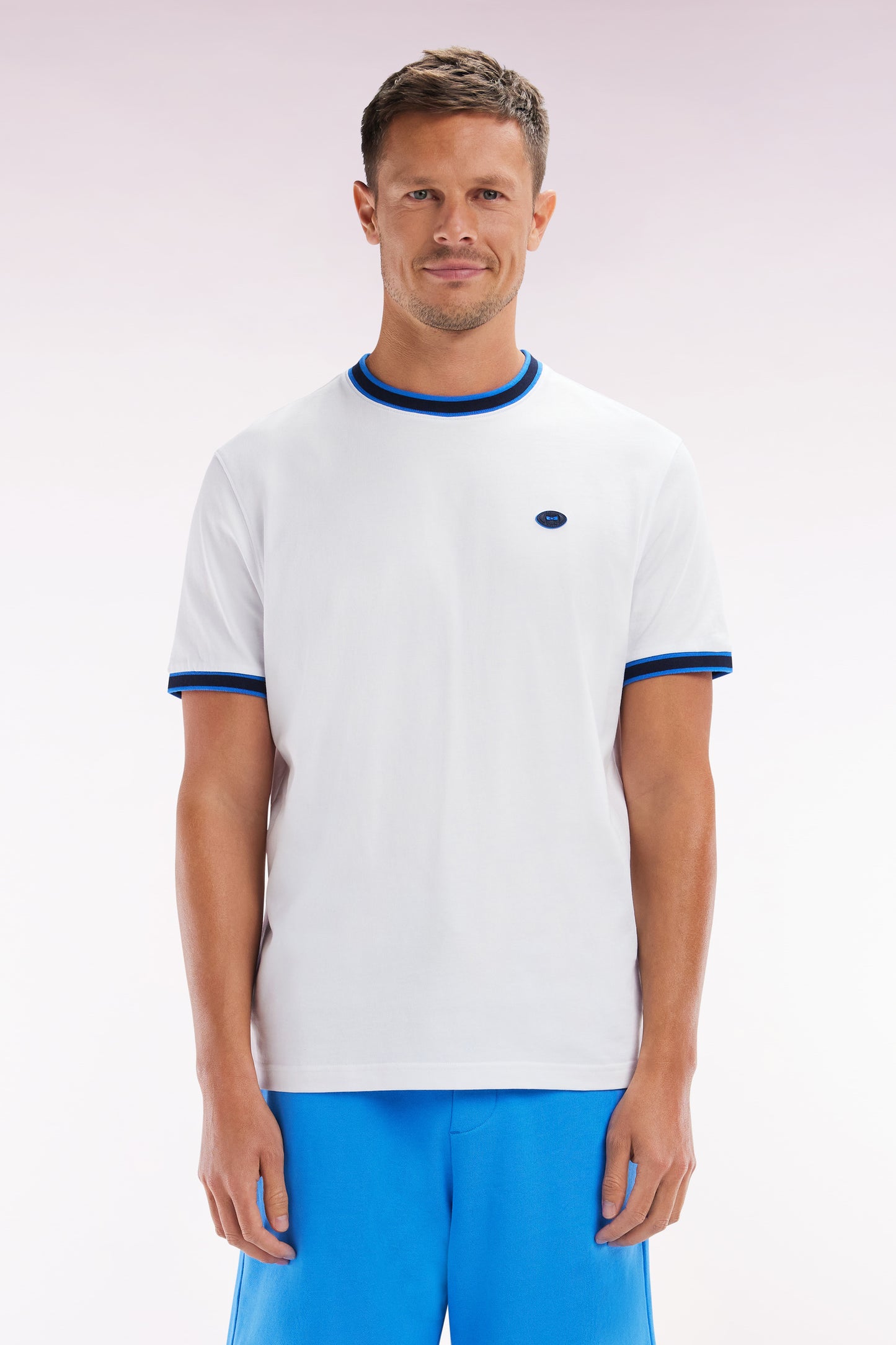 White cotton T-shirt with blue ribbing, relaxed fit